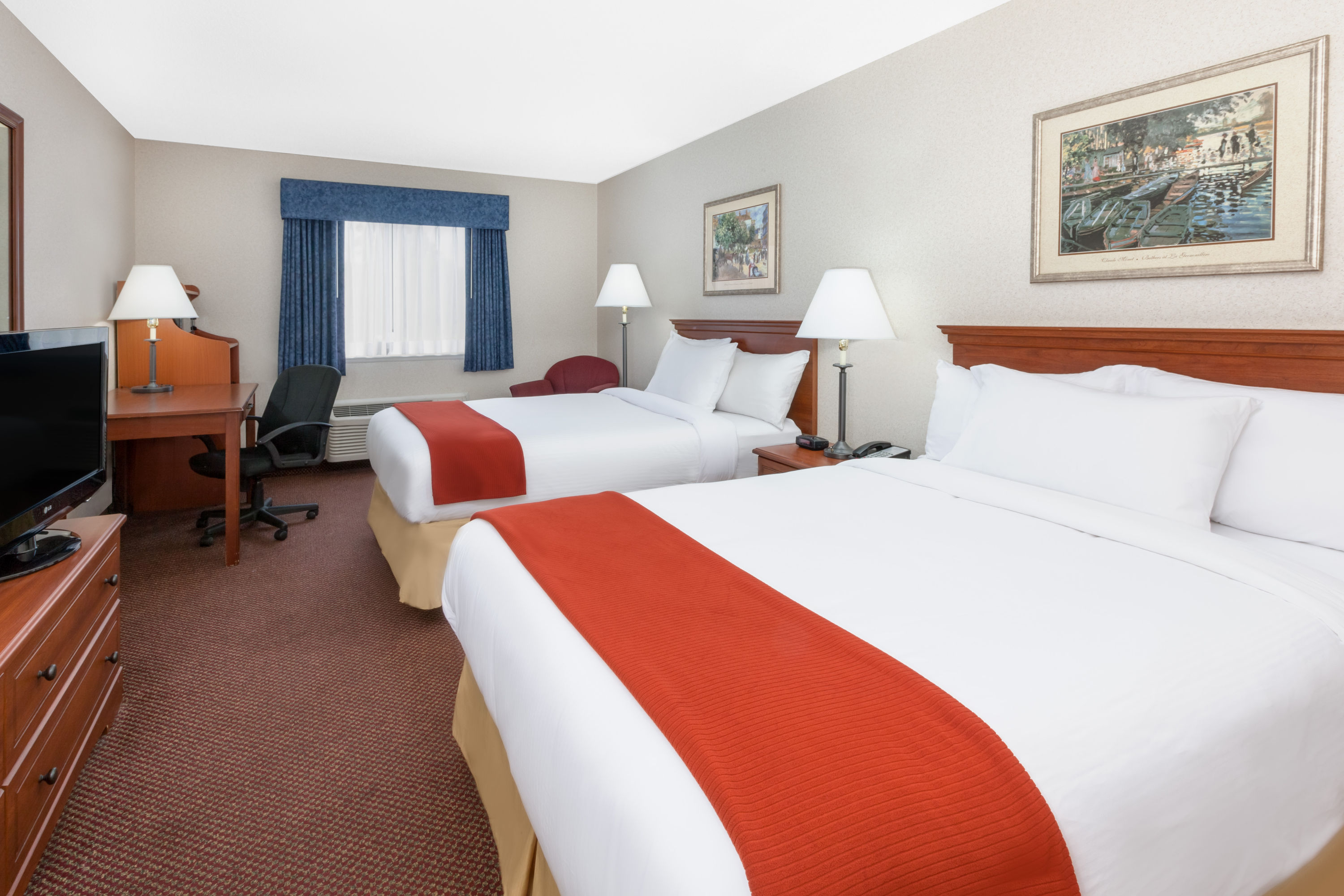 Guest room at the Baymont by Wyndham Howell/Brighton in Howell, Michigan