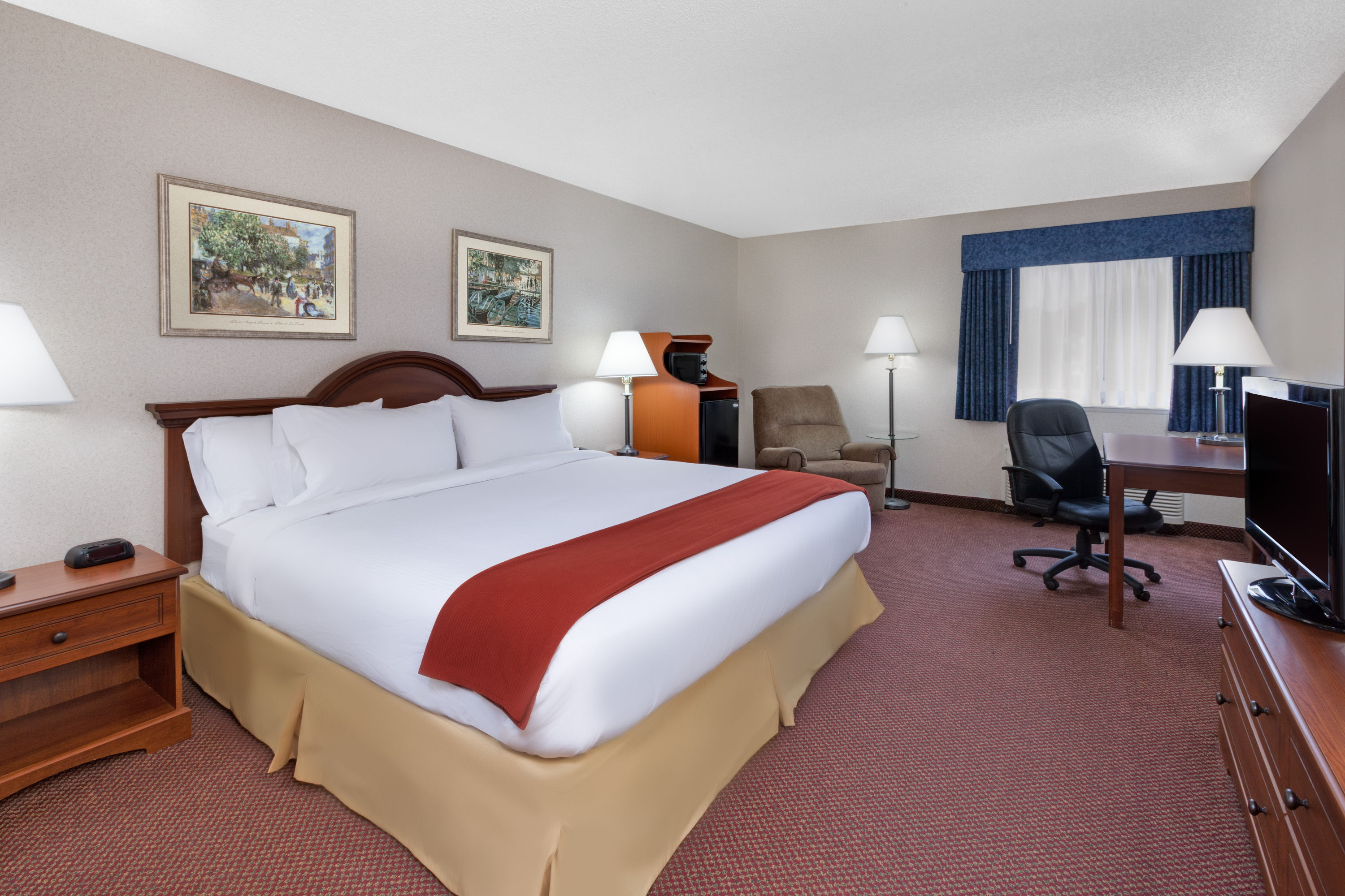 Guest room at the Baymont by Wyndham Howell/Brighton in Howell, Michigan