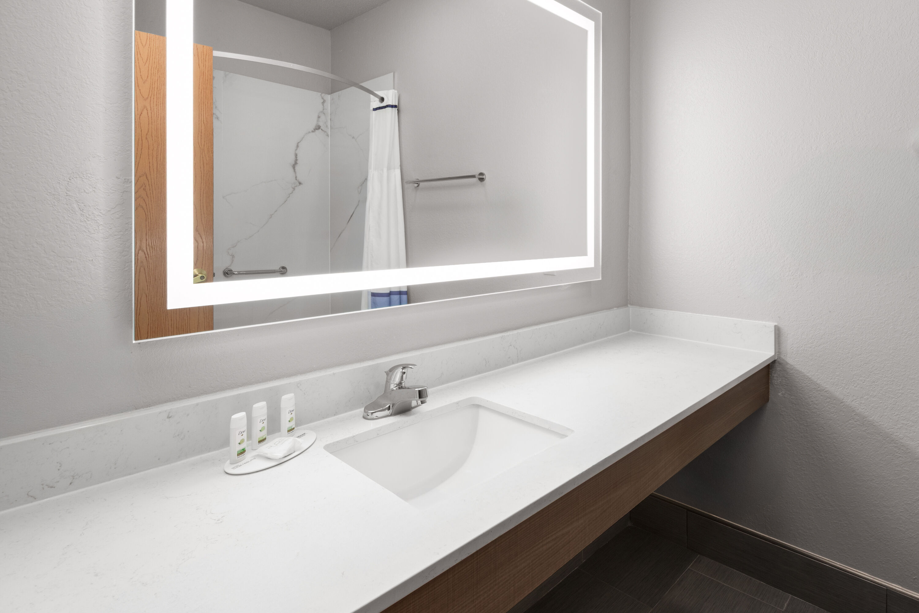 Guest room bath at the Baymont by Wyndham Paw Paw in Paw Paw, Michigan