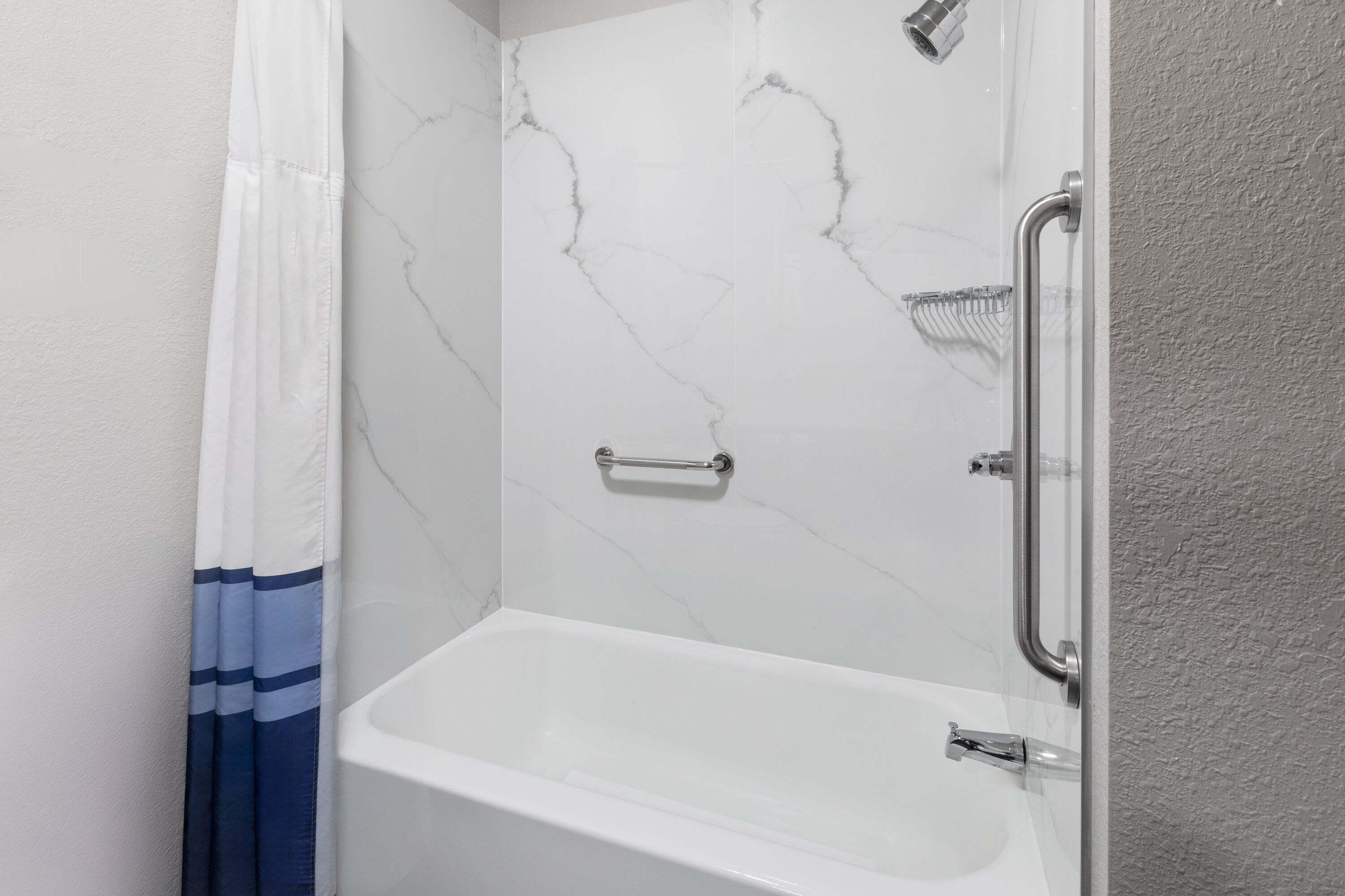 Guest room bath at the Baymont by Wyndham Paw Paw in Paw Paw, Michigan