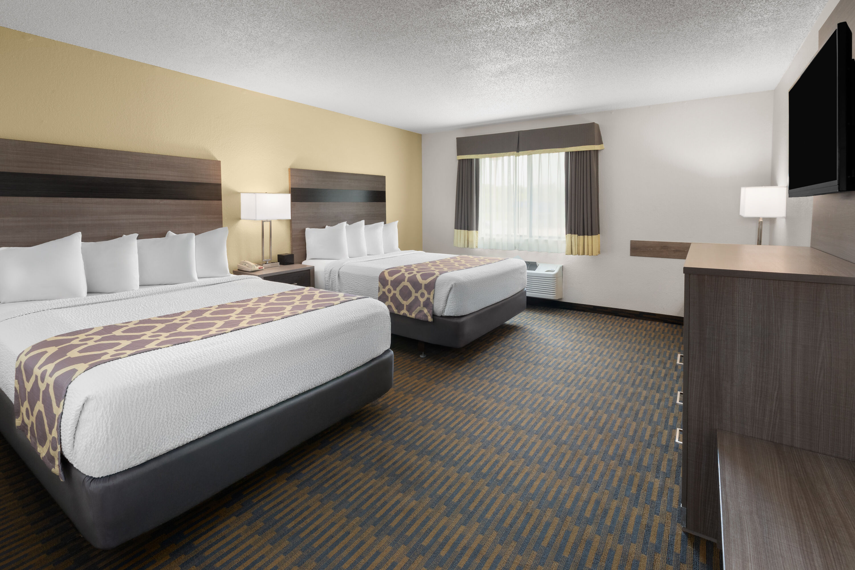 Guest room at the Baymont by Wyndham Paw Paw in Paw Paw, Michigan