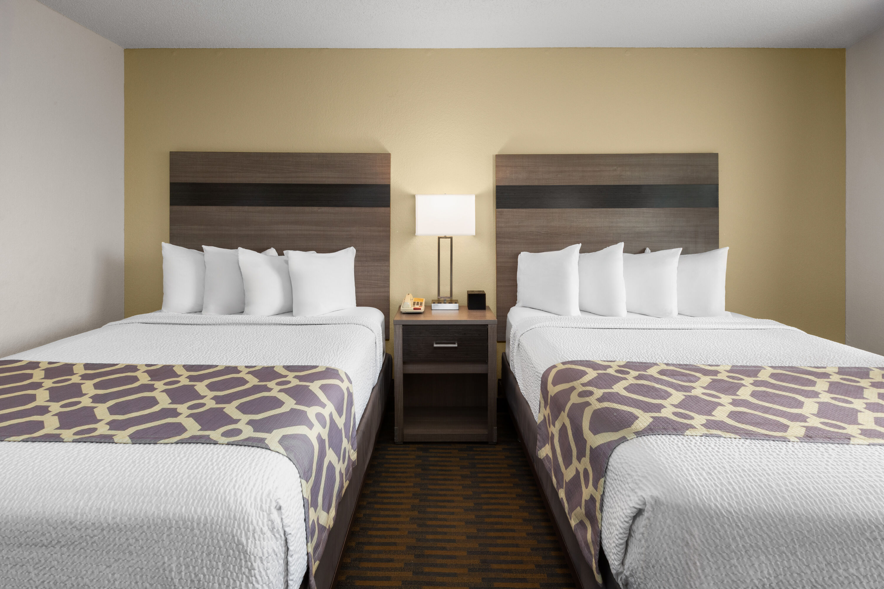 Guest room at the Baymont by Wyndham Paw Paw in Paw Paw, Michigan