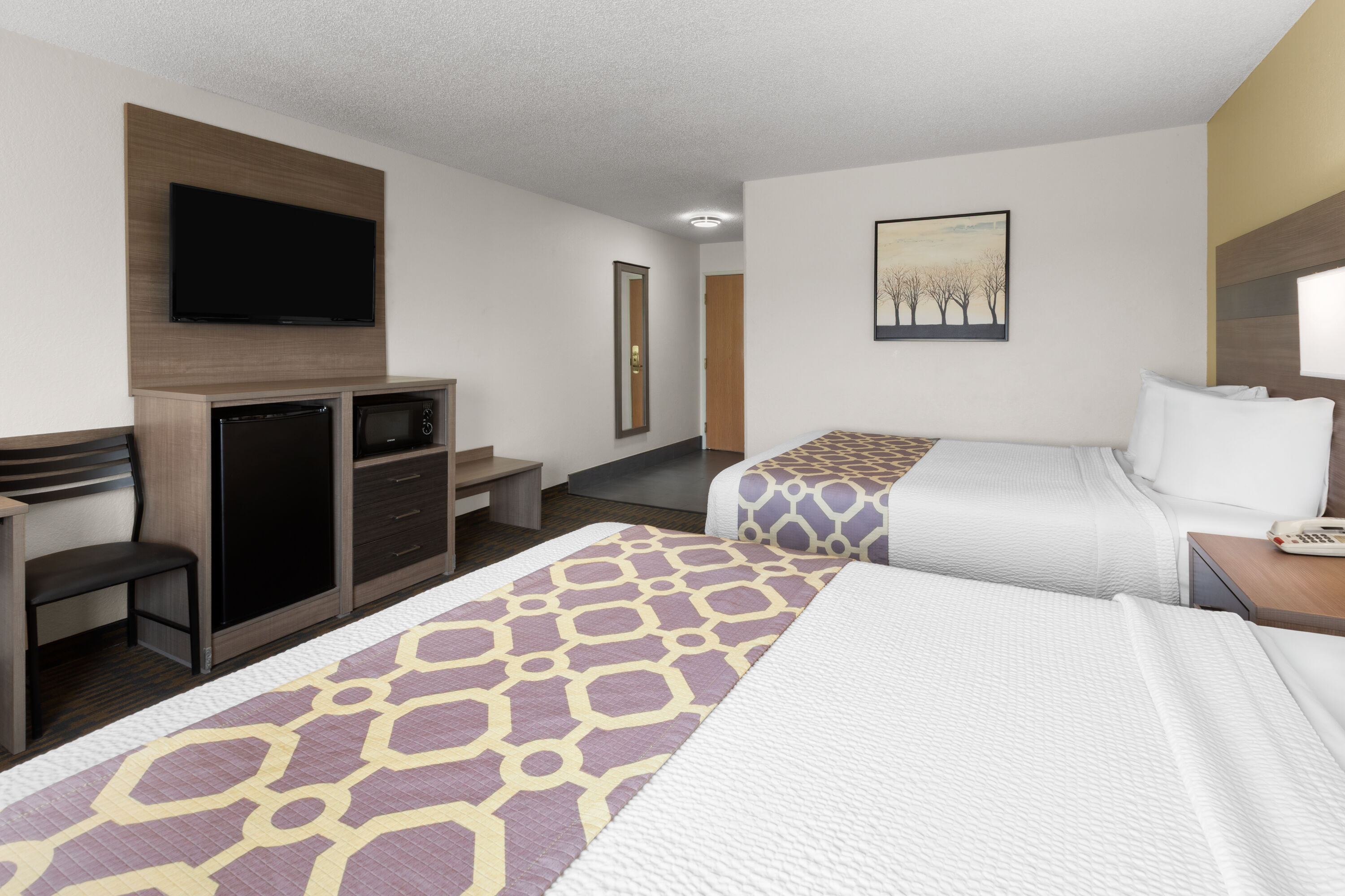 Guest room at the Baymont by Wyndham Paw Paw in Paw Paw, Michigan