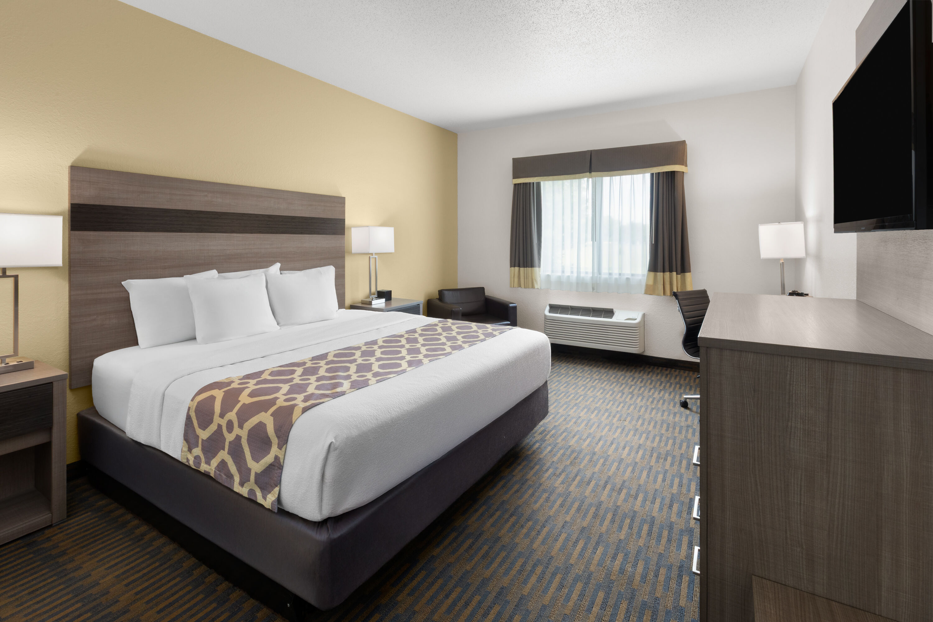 Guest room at the Baymont by Wyndham Paw Paw in Paw Paw, Michigan