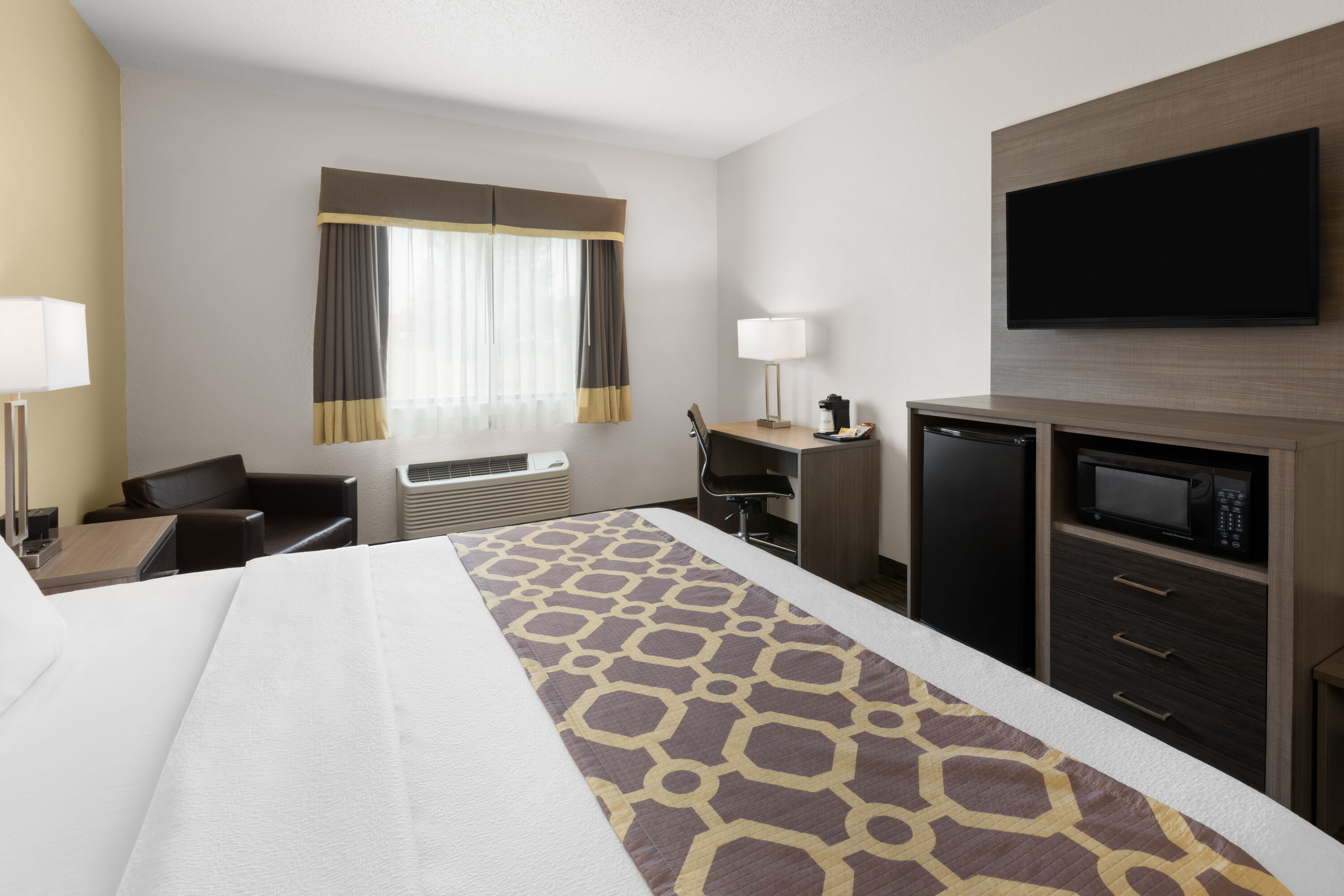 Guest room at the Baymont by Wyndham Paw Paw in Paw Paw, Michigan