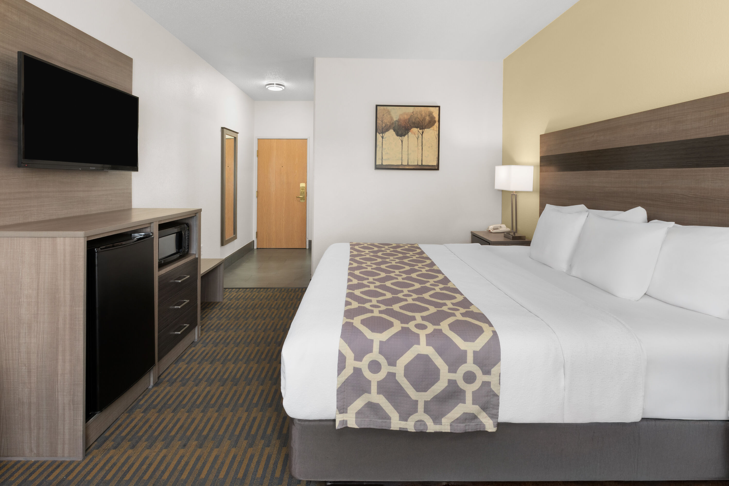 Guest room at the Baymont by Wyndham Paw Paw in Paw Paw, Michigan