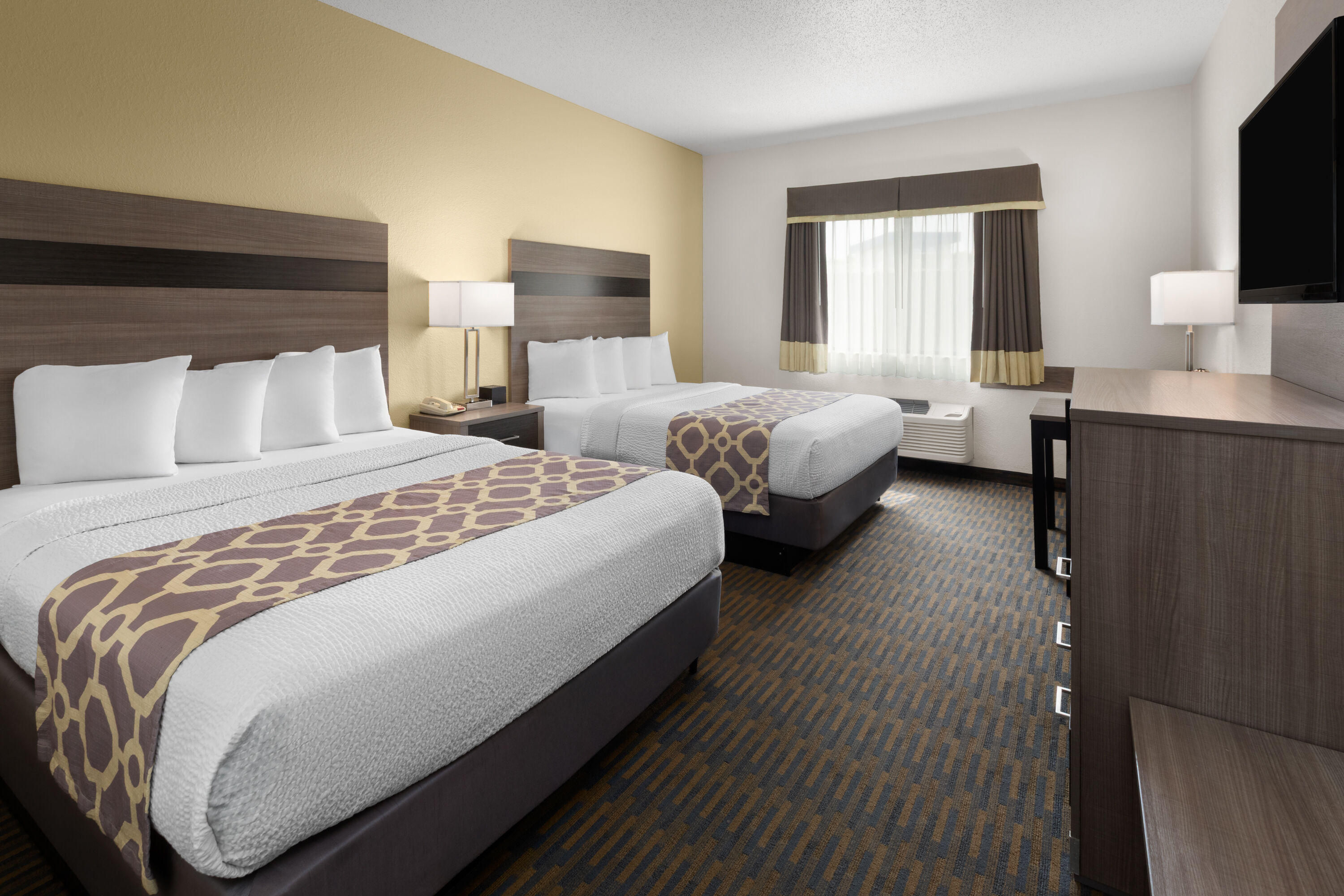 Guest room at the Baymont by Wyndham Paw Paw in Paw Paw, Michigan