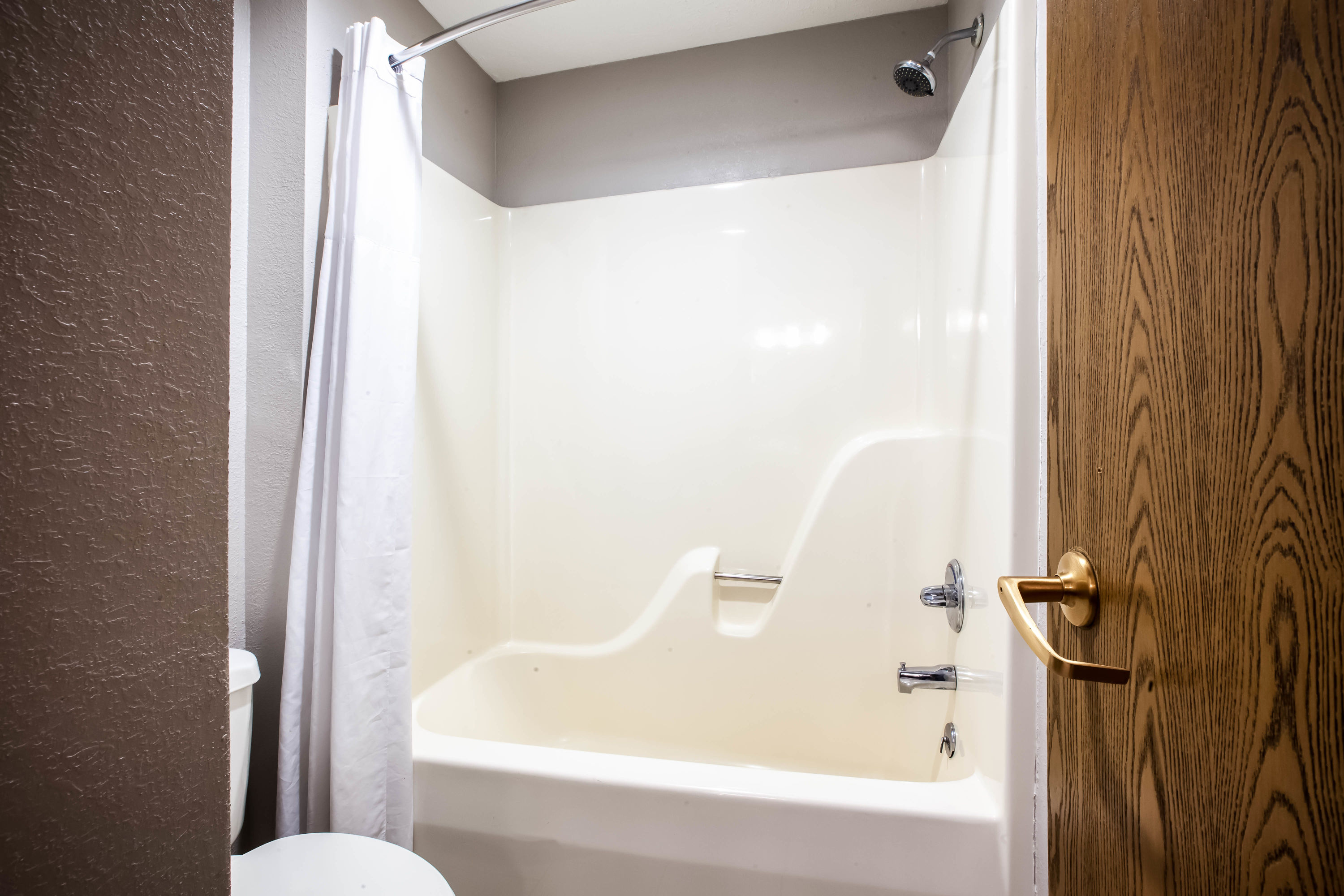 Guest room bath at the Baymont by Wyndham Traverse City in Traverse City, Michigan
