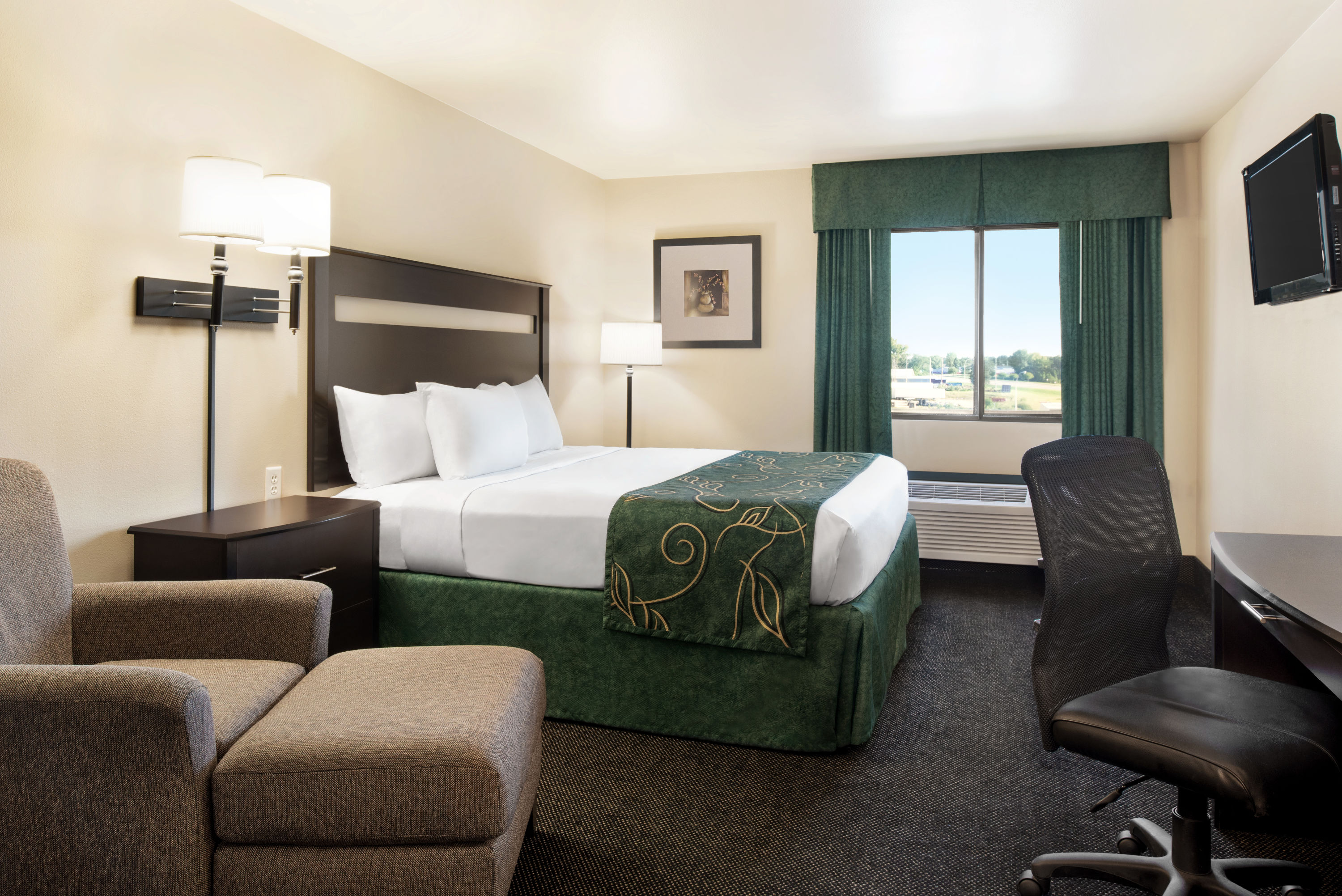 Guest room at the Baymont by Wyndham Glenwood in Glenwood, Minnesota