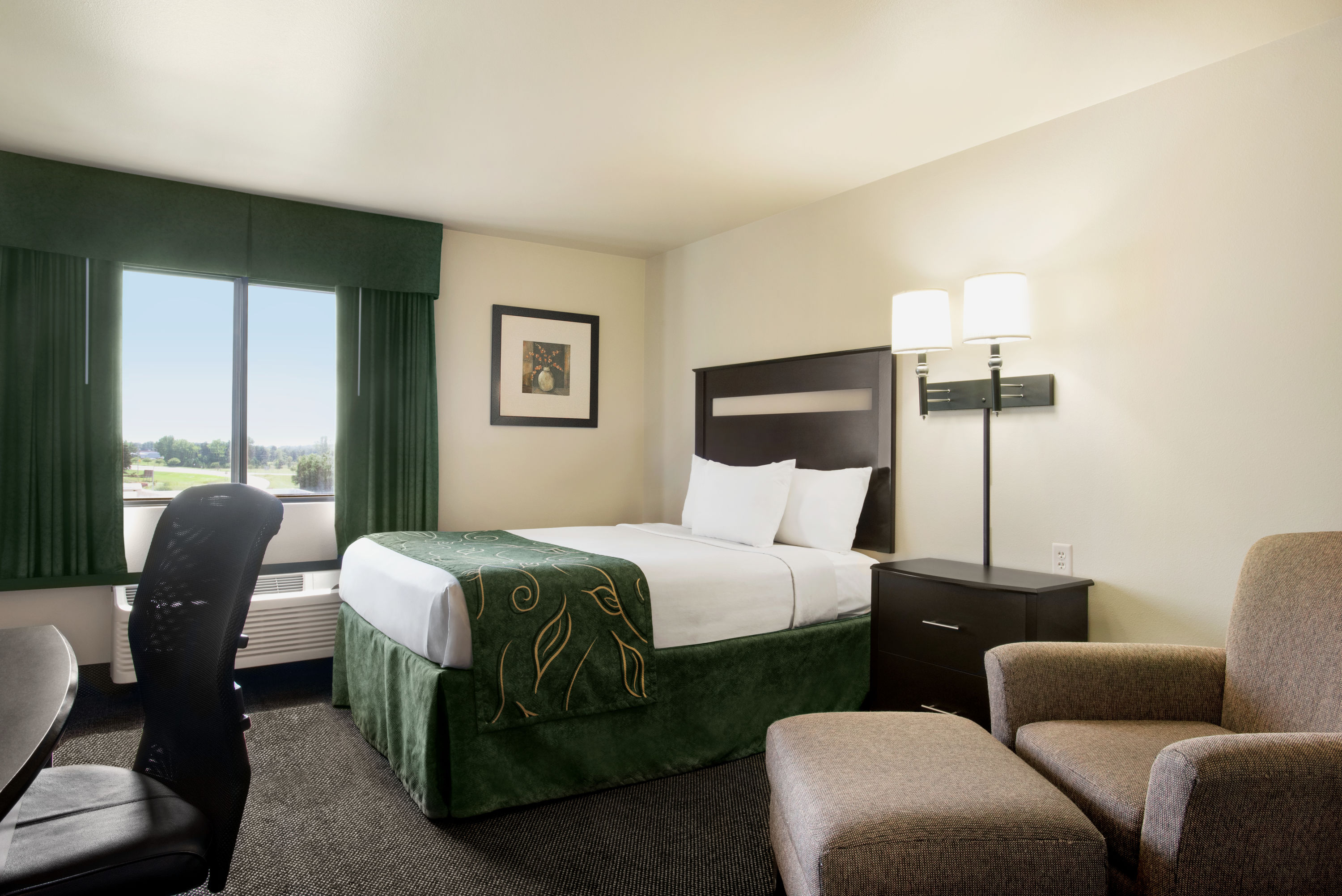 Guest room at the Baymont by Wyndham Glenwood in Glenwood, Minnesota