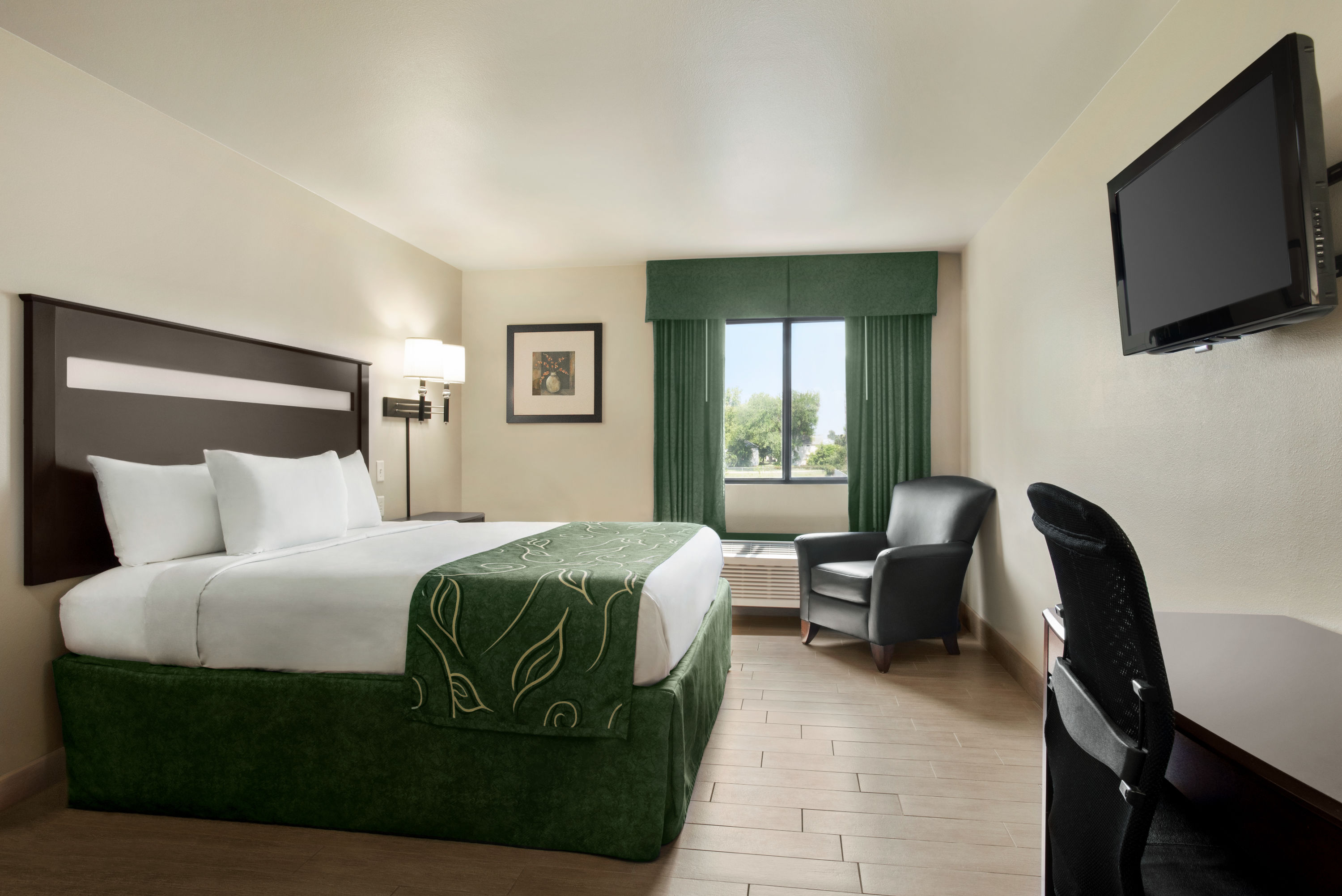 Guest room at the Baymont by Wyndham Glenwood in Glenwood, Minnesota