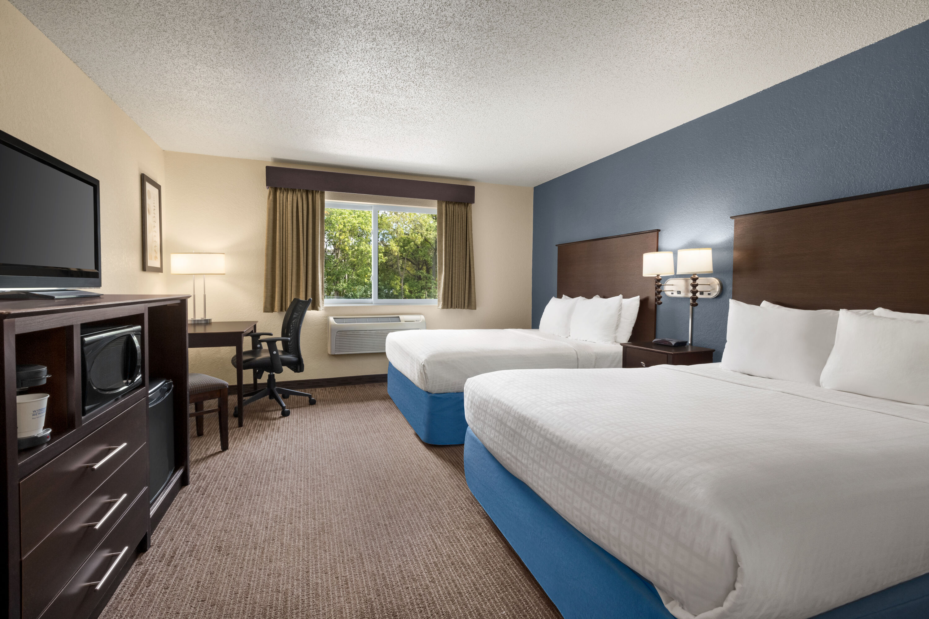 Guest room at the Baymont by Wyndham Owatonna in Owatonna, Minnesota