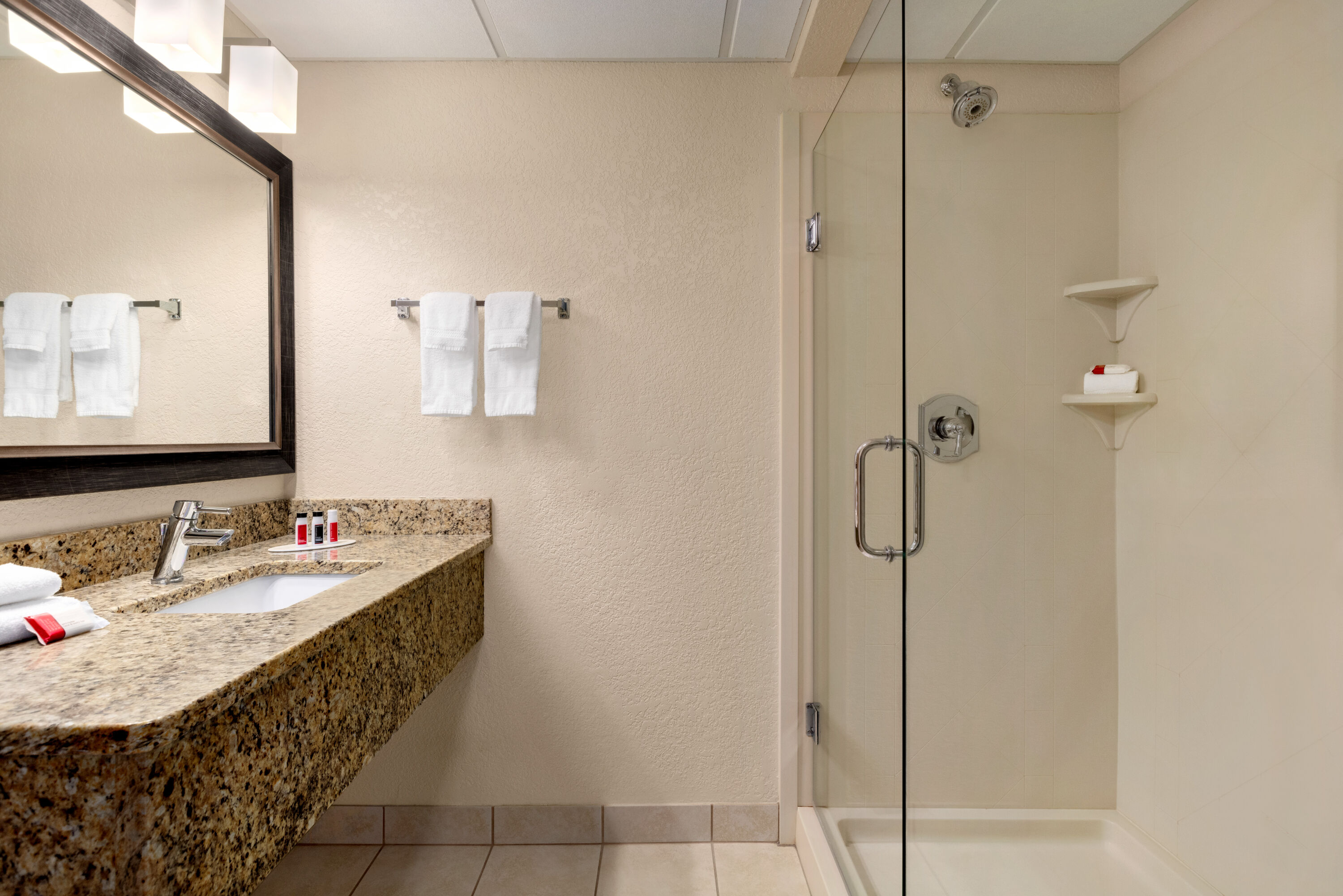 Guest room bath at the Baymont by Wyndham Owatonna in Owatonna, Minnesota