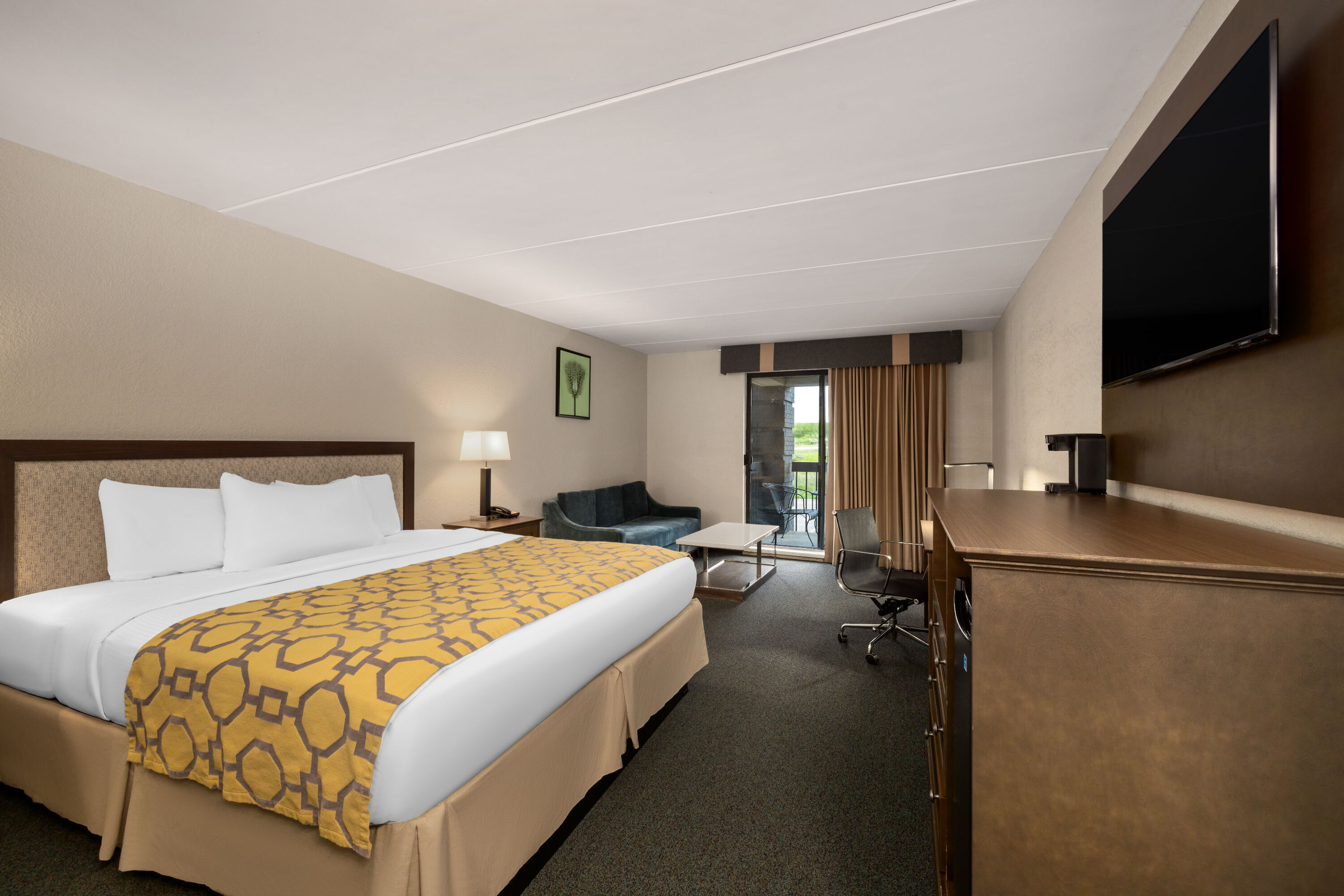 Guest room at the Baymont by Wyndham Shakopee in Shakopee, Minnesota