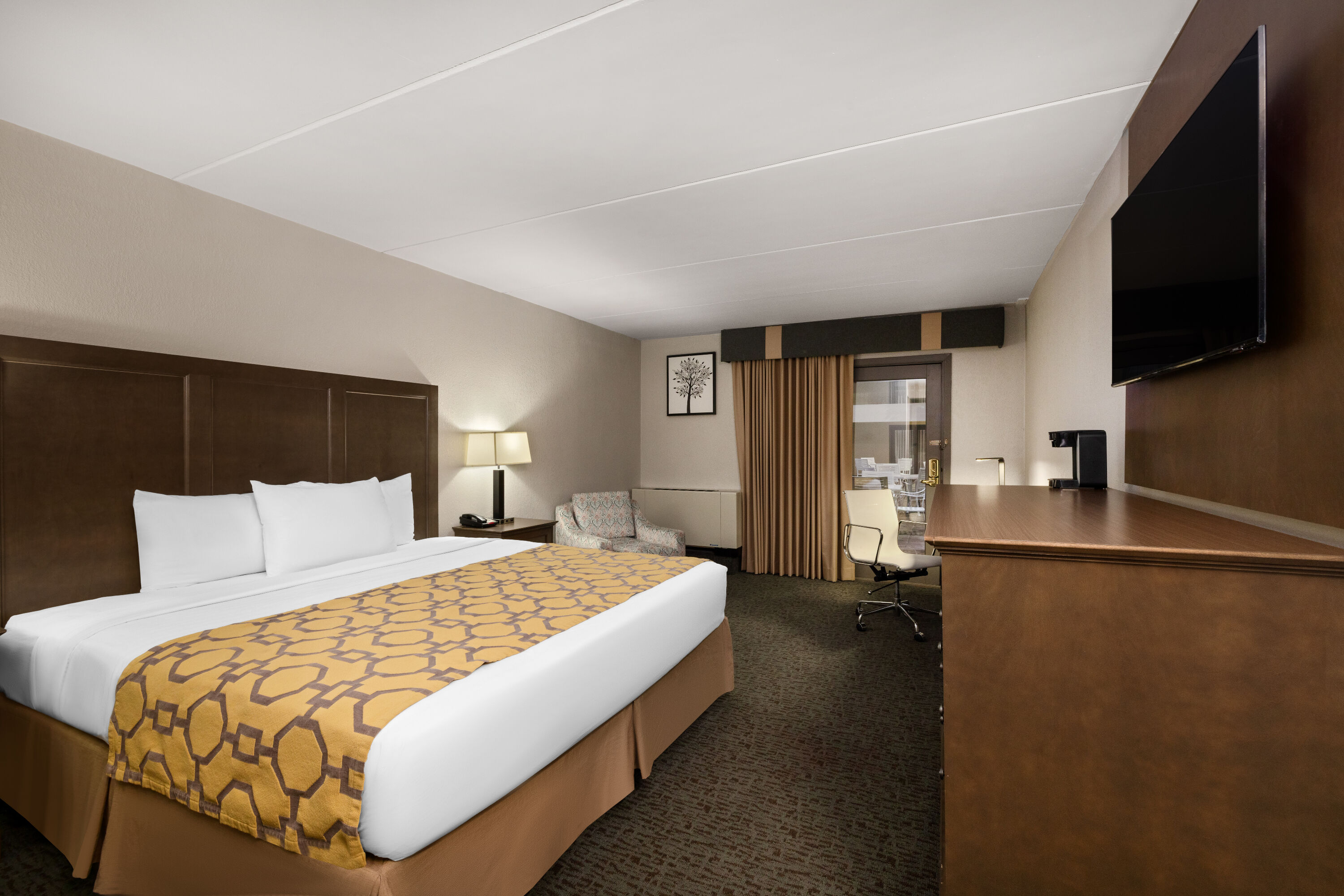 Guest room at the Baymont by Wyndham Shakopee in Shakopee, Minnesota