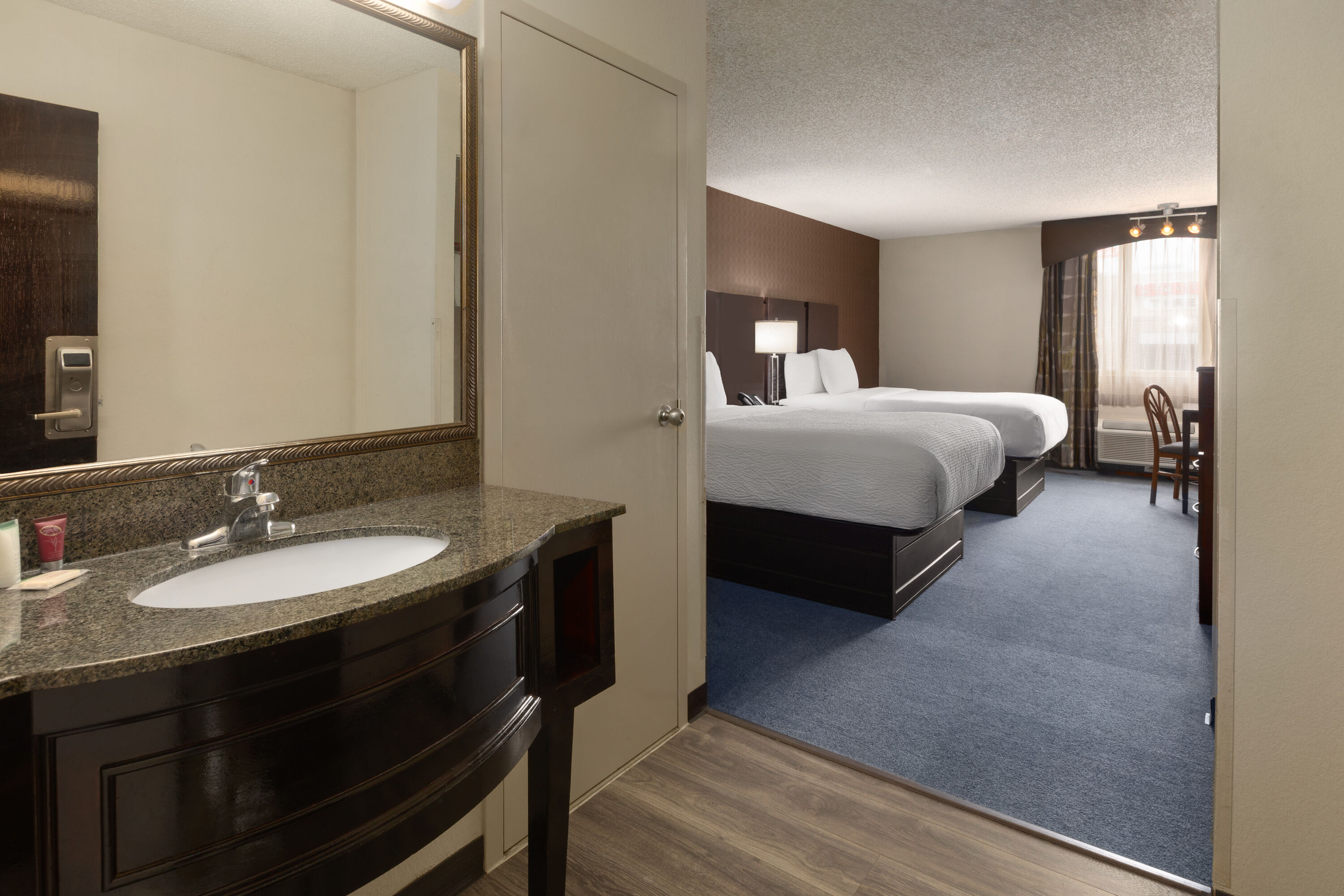 Guest room at the Baymont by Wyndham Festus in Festus, Missouri