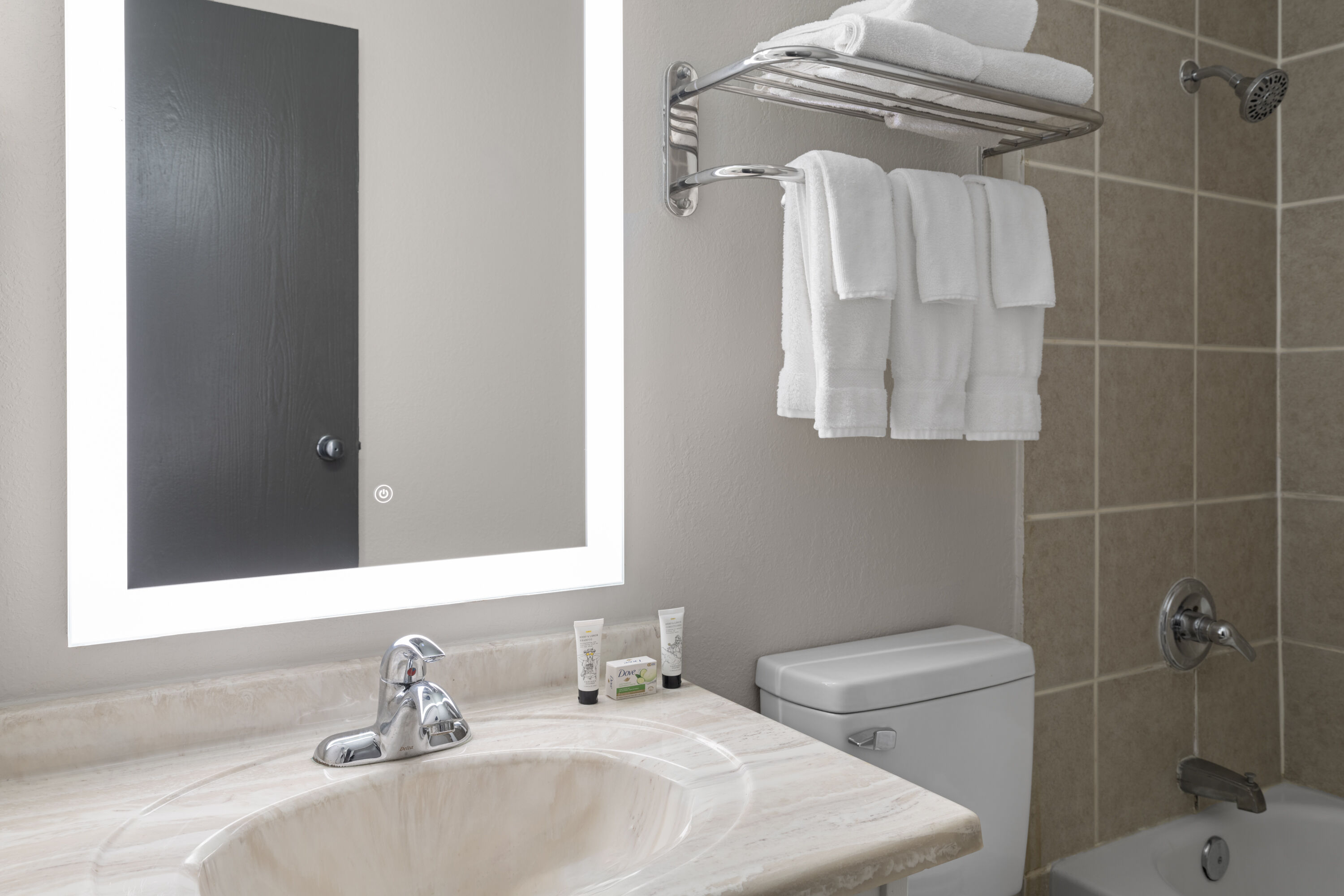 Guest room bath at the Baymont by Wyndham Liberty MO in Liberty, Missouri