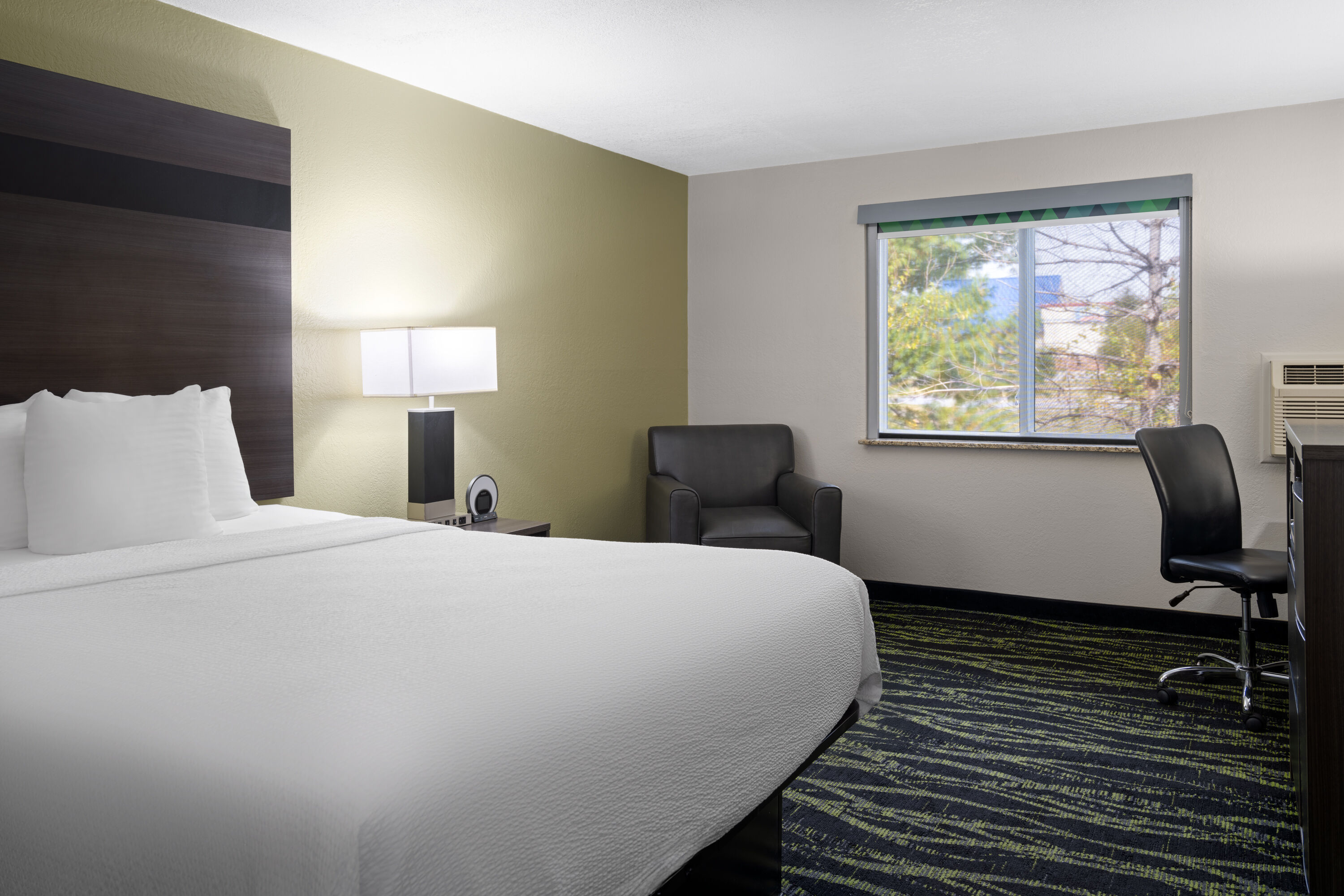 Guest room at the Baymont by Wyndham Liberty MO in Liberty, Missouri