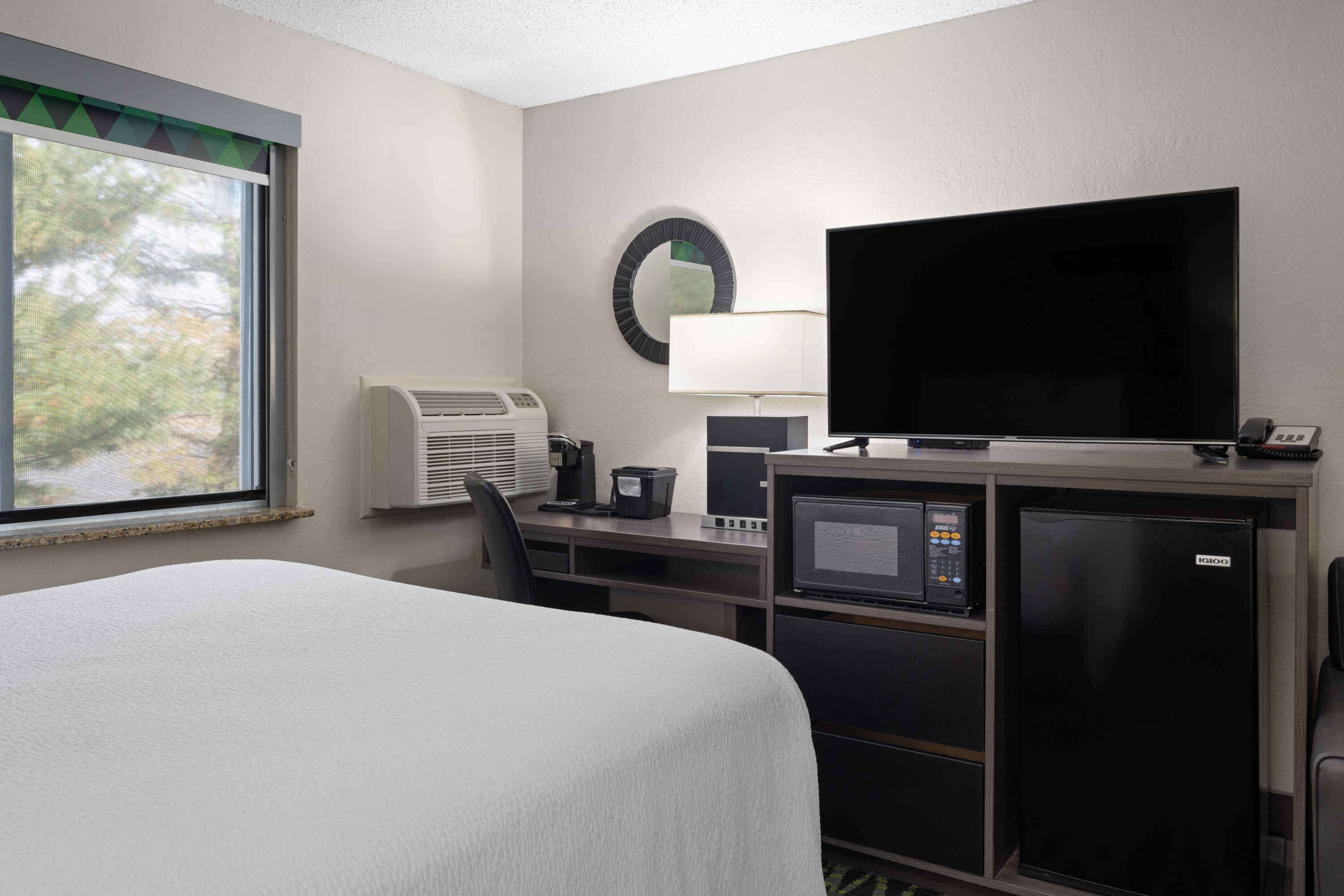 Guest room at the Baymont by Wyndham Liberty MO in Liberty, Missouri