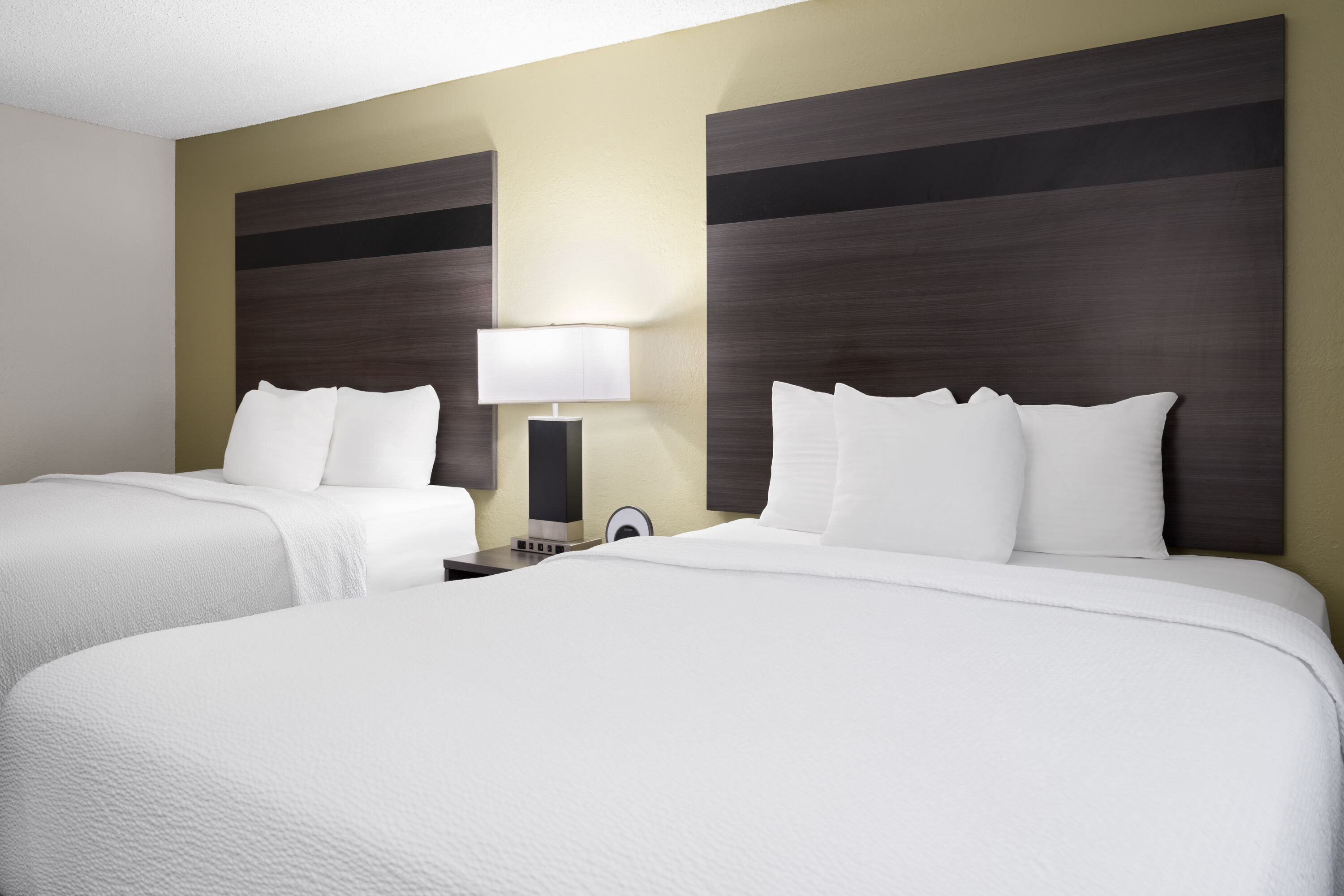 Guest room at the Baymont by Wyndham Liberty MO in Liberty, Missouri