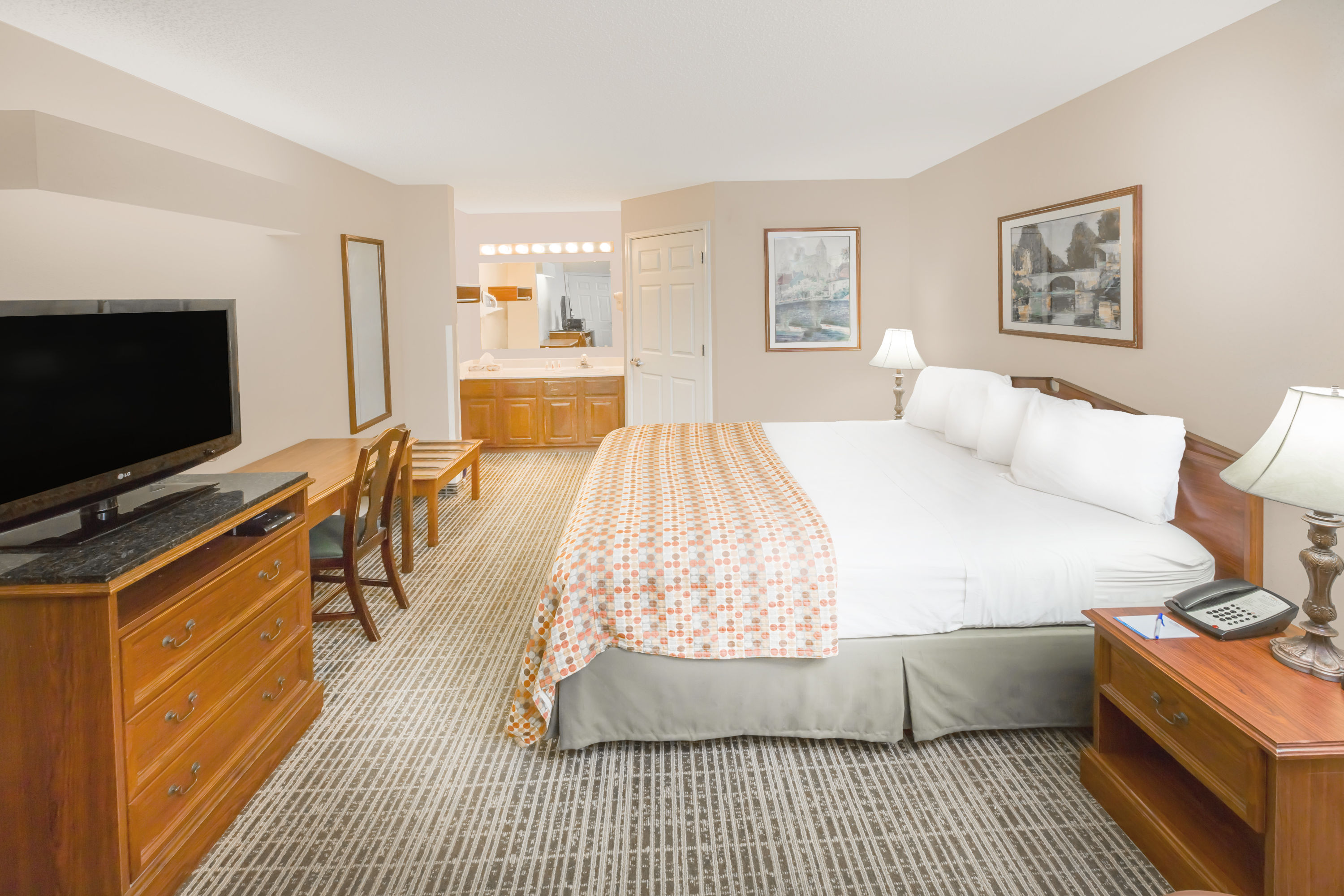 Guest room at the Baymont by Wyndham Grenada in Grenada, Mississippi