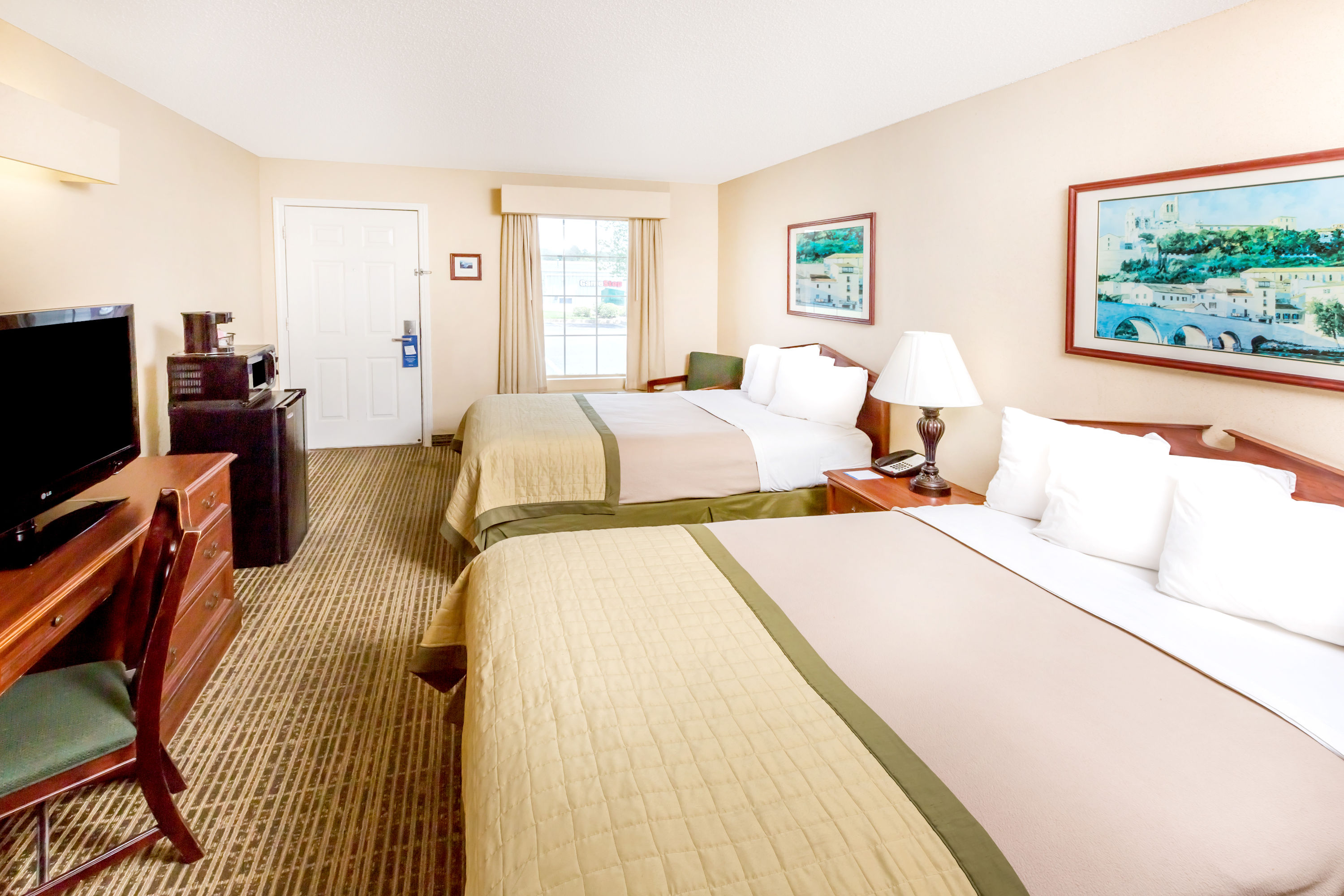 Guest room at the Baymont by Wyndham Grenada in Grenada, Mississippi