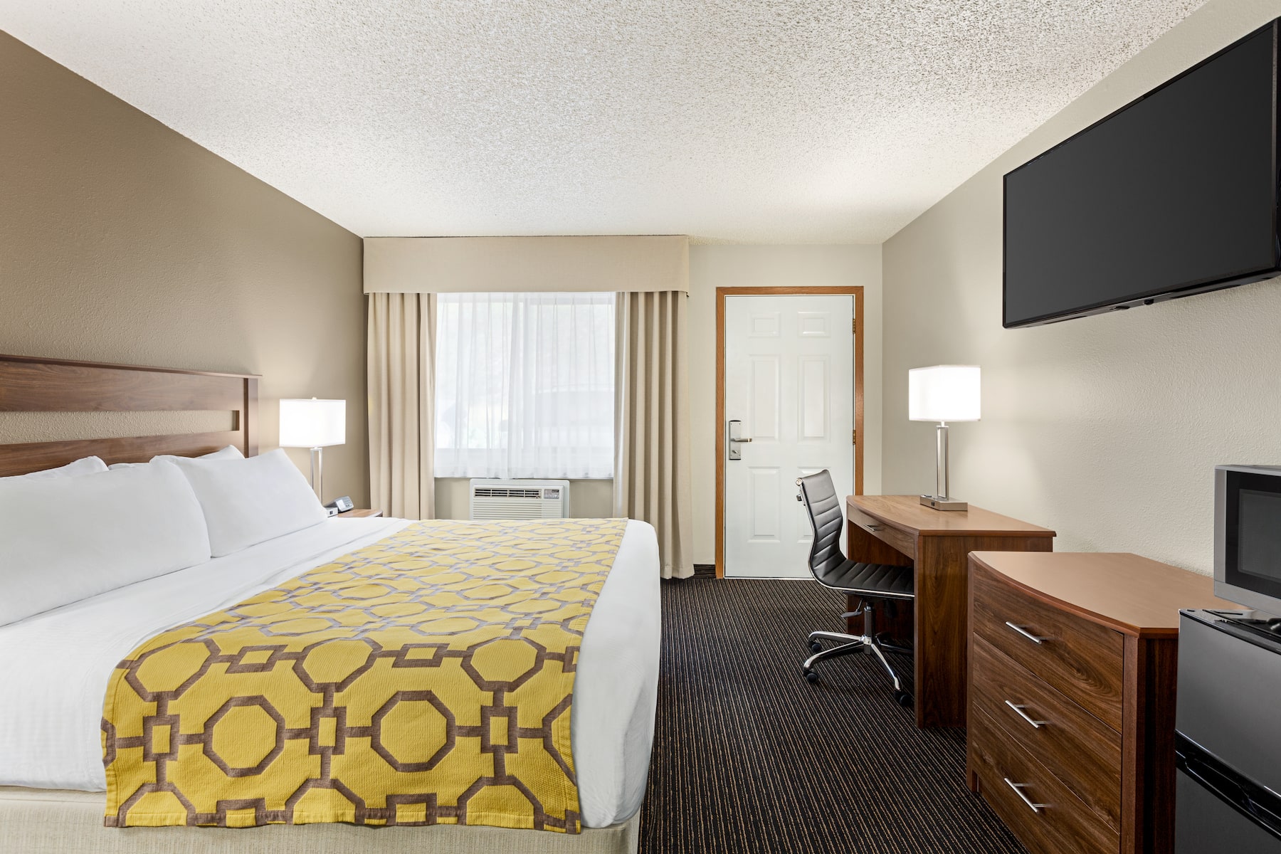 Guest room at the Baymont by Wyndham Whitefish in Whitefish, Montana