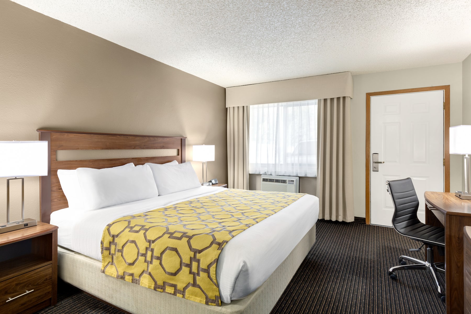 Guest room at the Baymont by Wyndham Whitefish in Whitefish, Montana