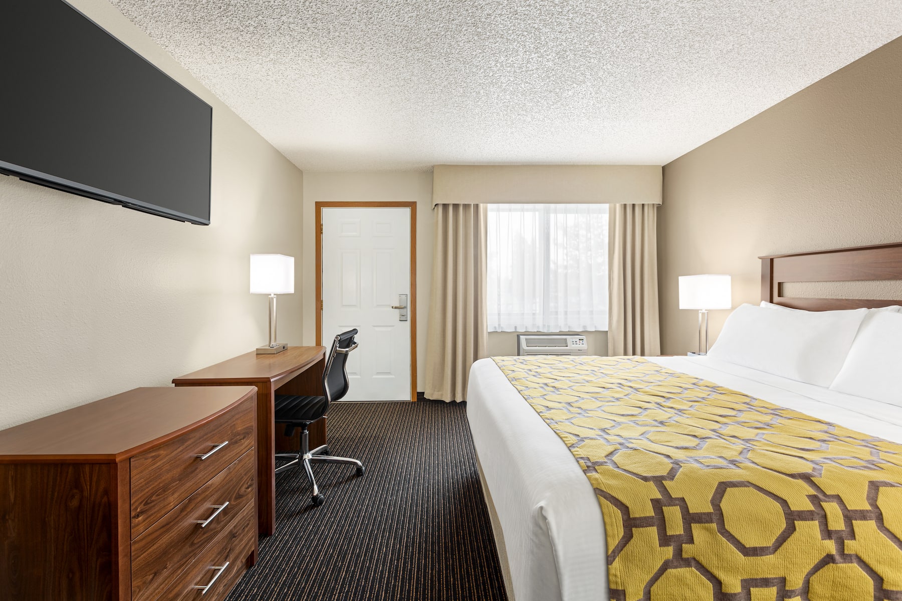 Guest room at the Baymont by Wyndham Whitefish in Whitefish, Montana