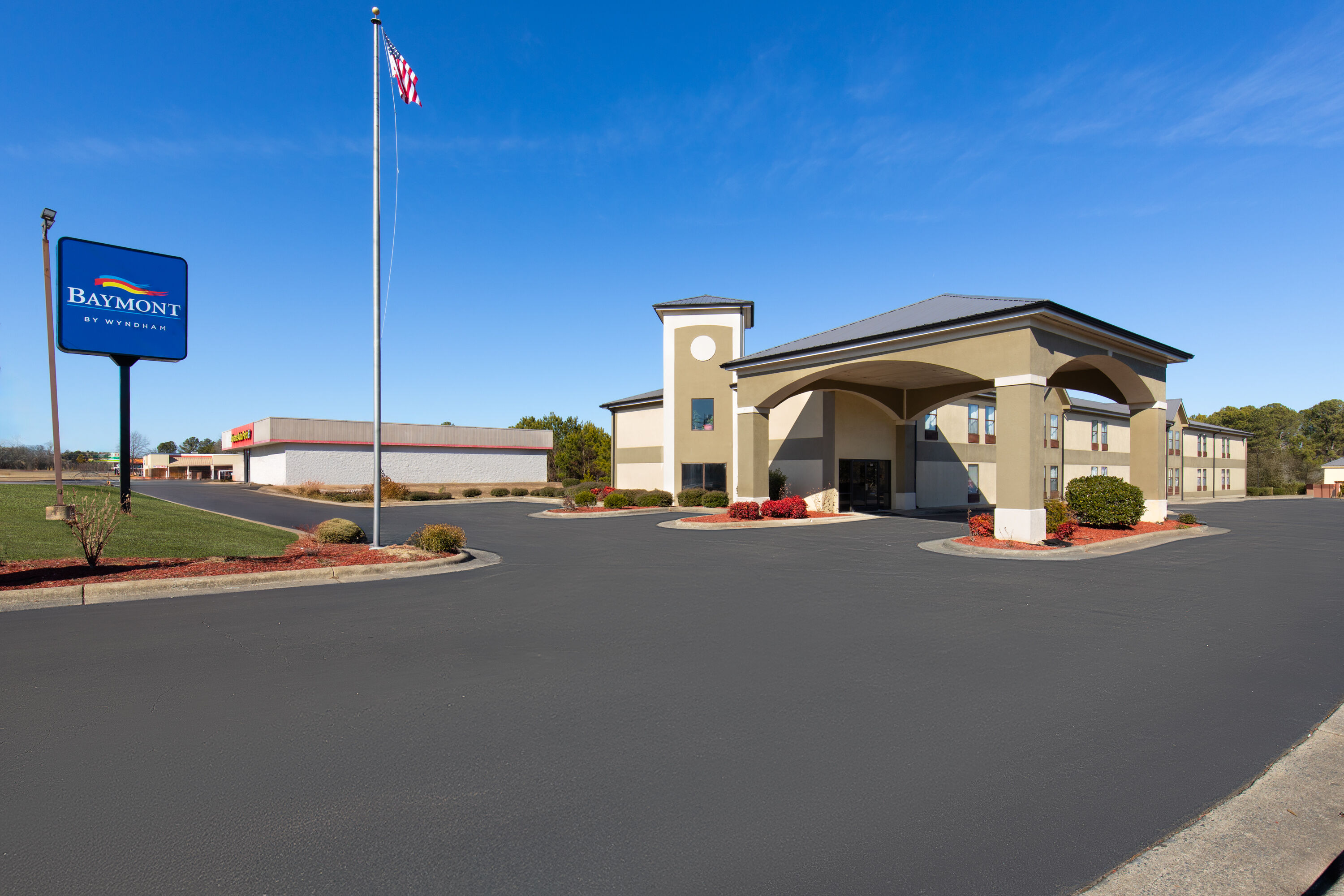 Exterior Day Image of Baymont by Wyndham Creedmoor hotel in Creedmoor, North Carolina
