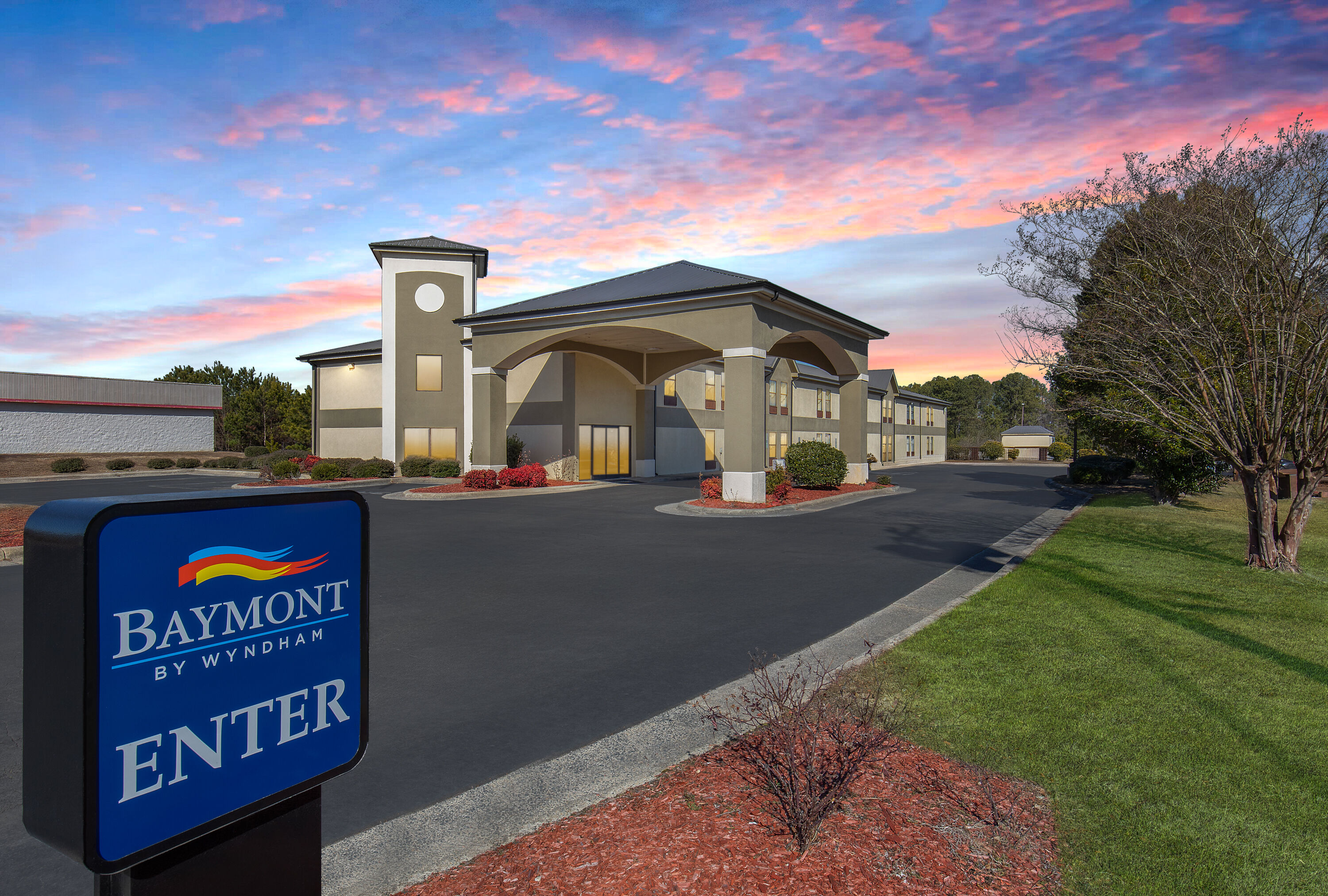 Exterior Dusk Image of Baymont by Wyndham Creedmoor hotel in Creedmoor, North Carolina