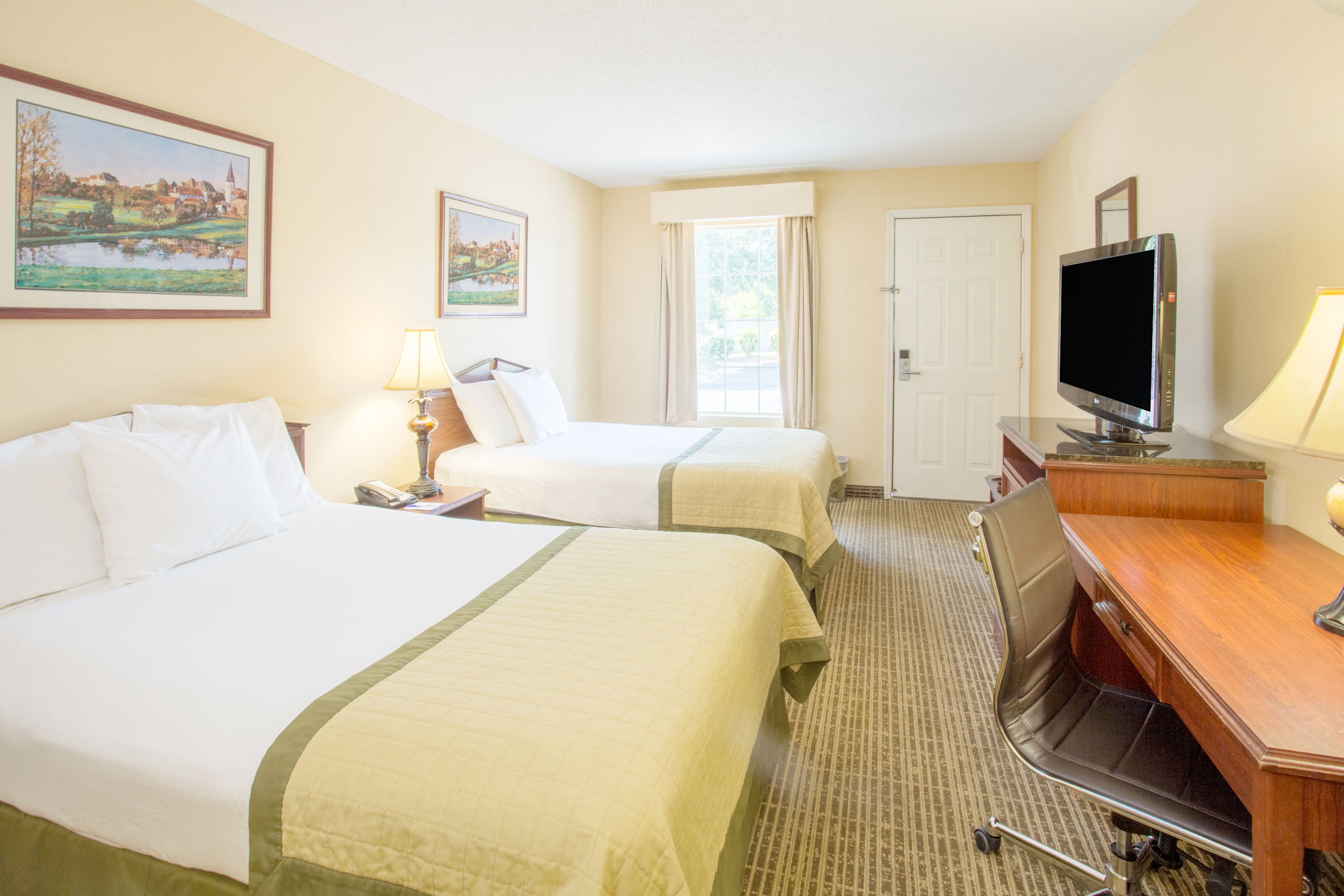 Guest room at the Baymont by Wyndham Dunn in Dunn, North Carolina