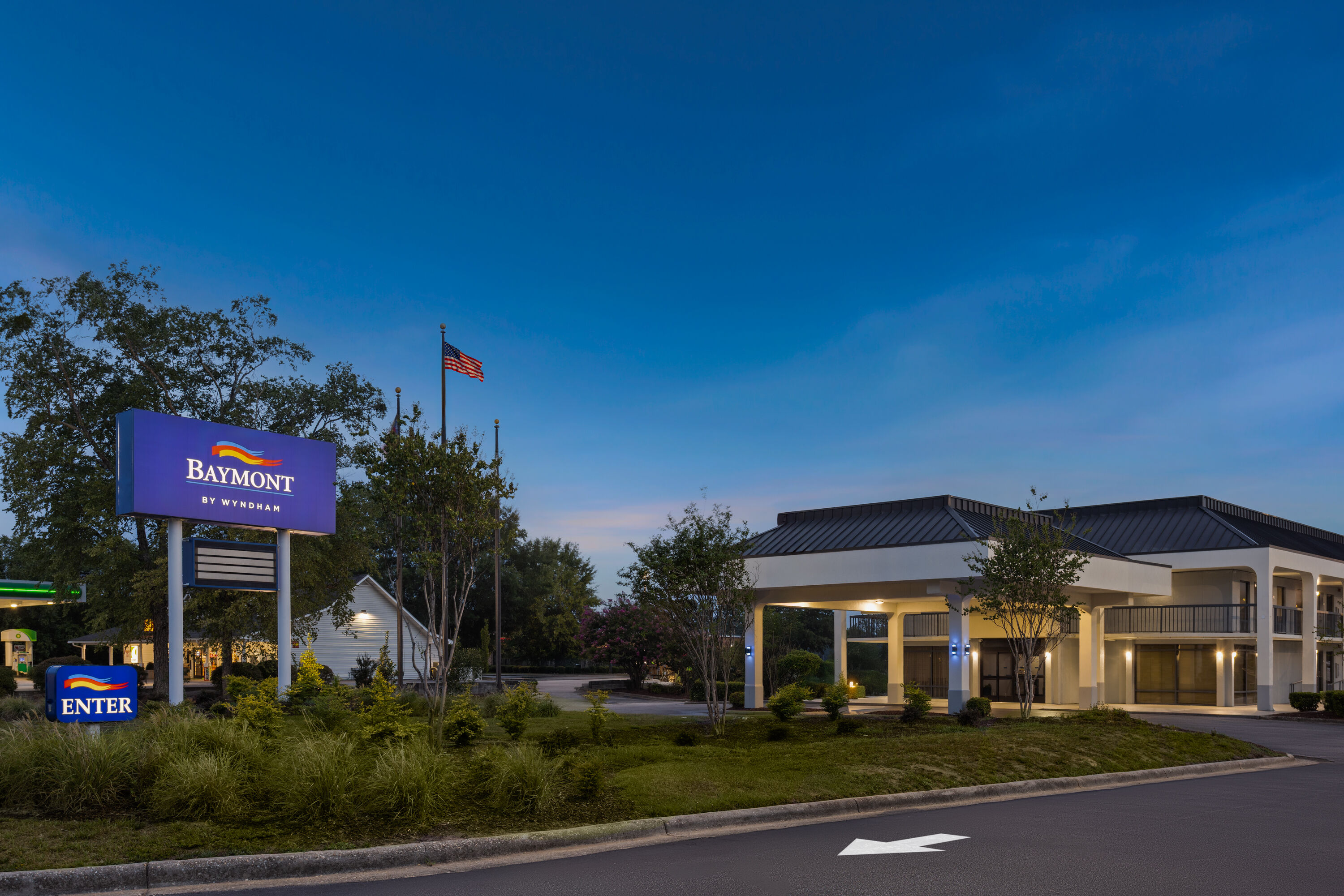 Exterior Dusk Image of Baymont by Wyndham Fayetteville NC hotel in Fayetteville, North Carolina