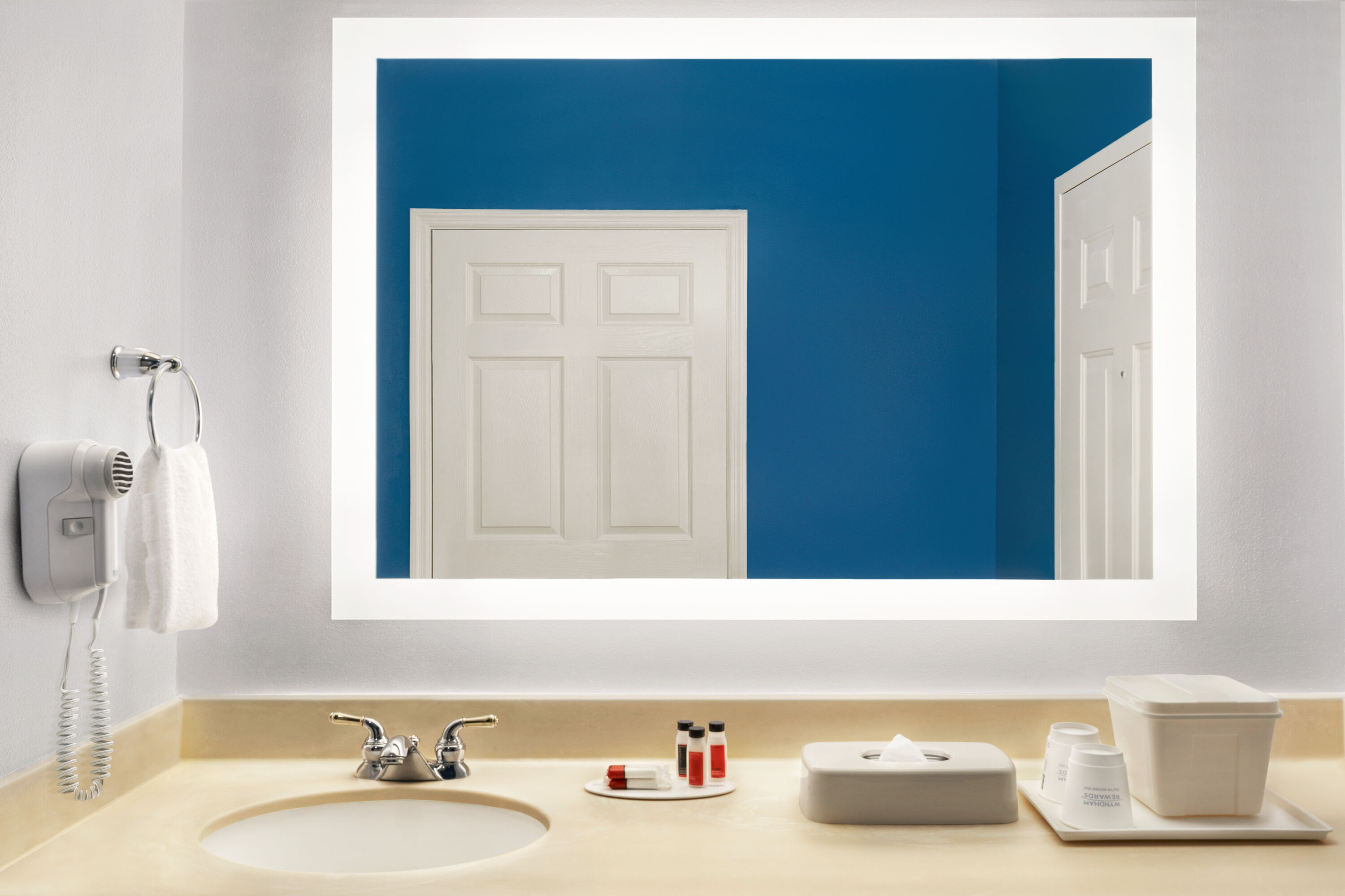 Guest room bath at the Baymont by Wyndham Henderson Oxford in Henderson, North Carolina