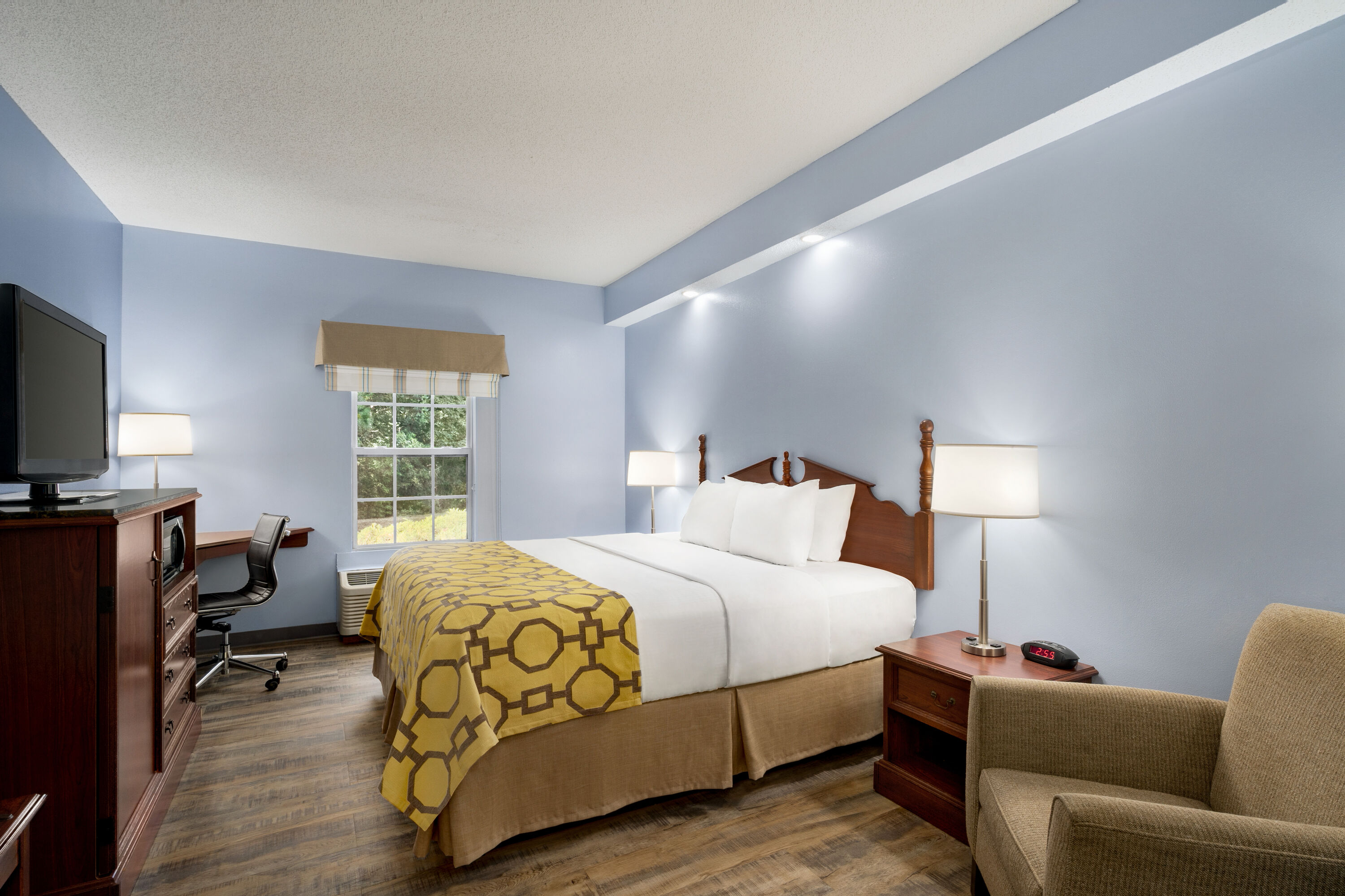 Guest room at the Baymont by Wyndham Henderson Oxford in Henderson, North Carolina