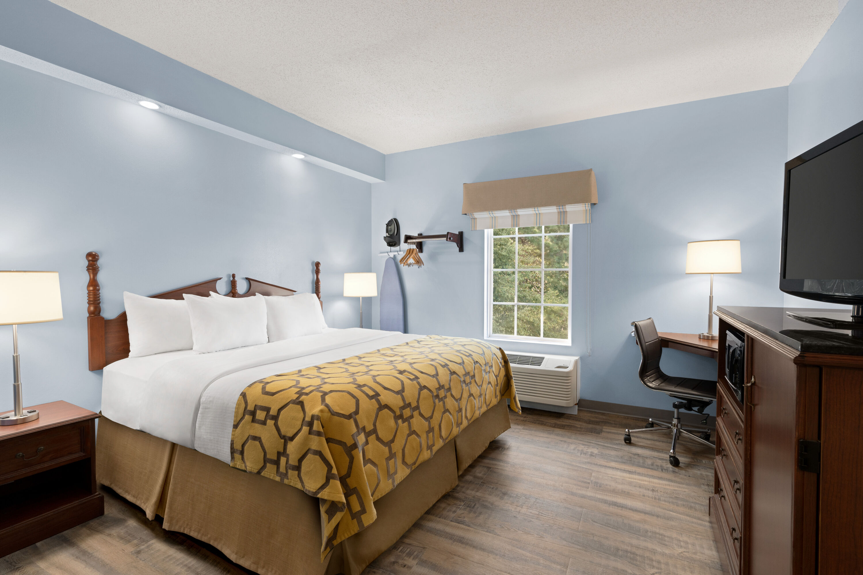 Guest room at the Baymont by Wyndham Henderson Oxford in Henderson, North Carolina