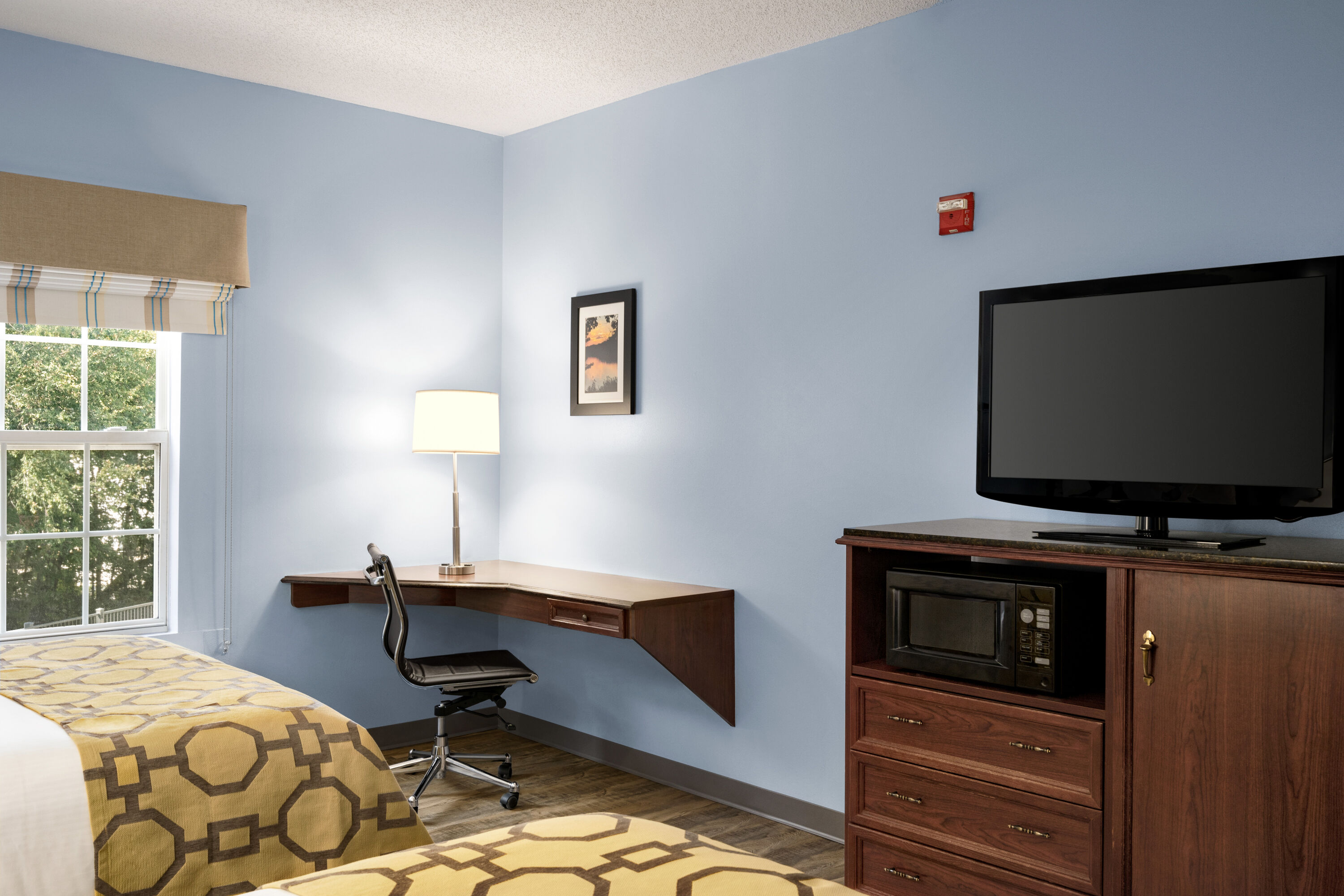 Guest room at the Baymont by Wyndham Henderson Oxford in Henderson, North Carolina
