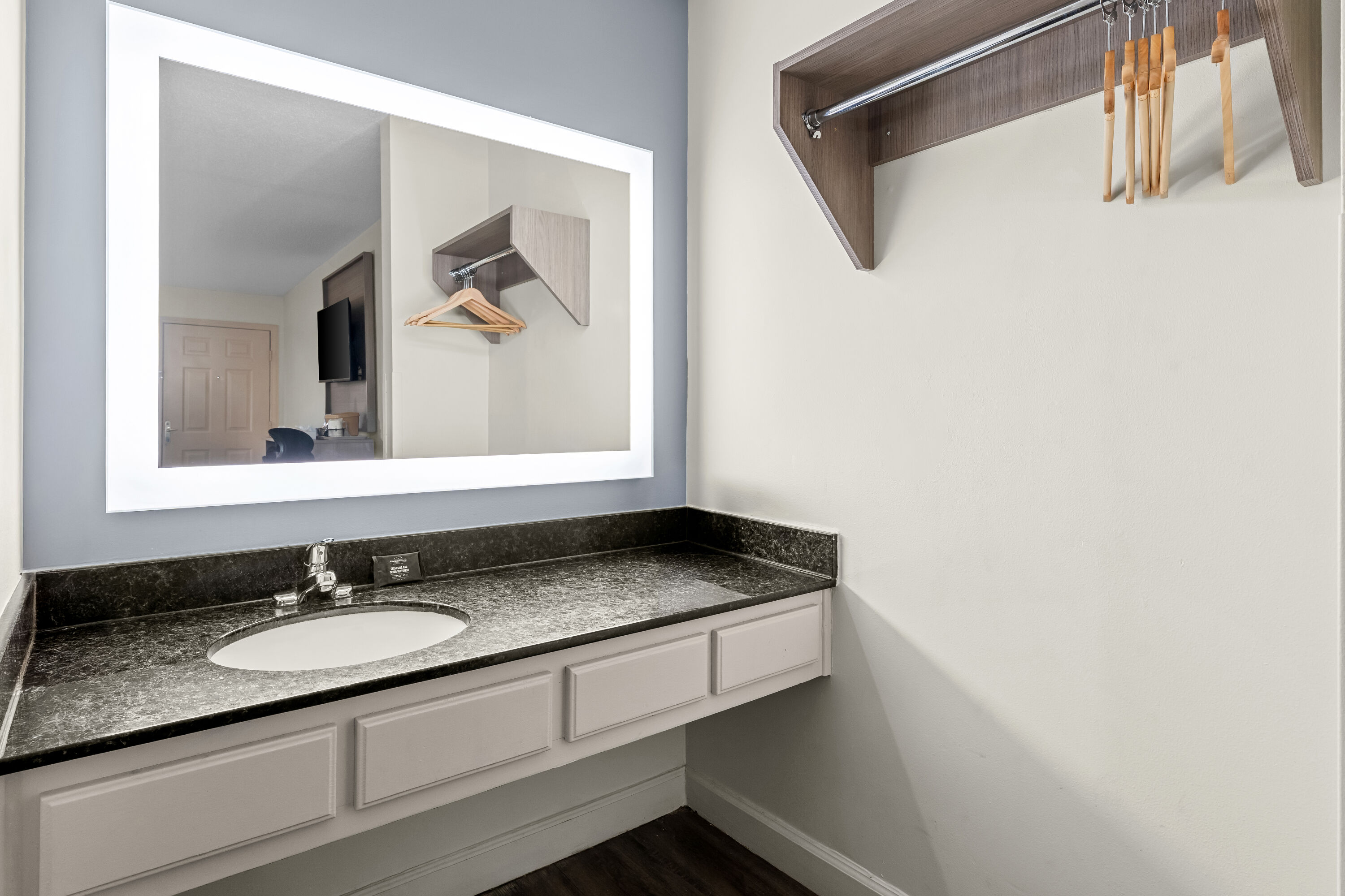 Guest room bath at the Baymont by Wyndham Sanford in Sanford, North Carolina
