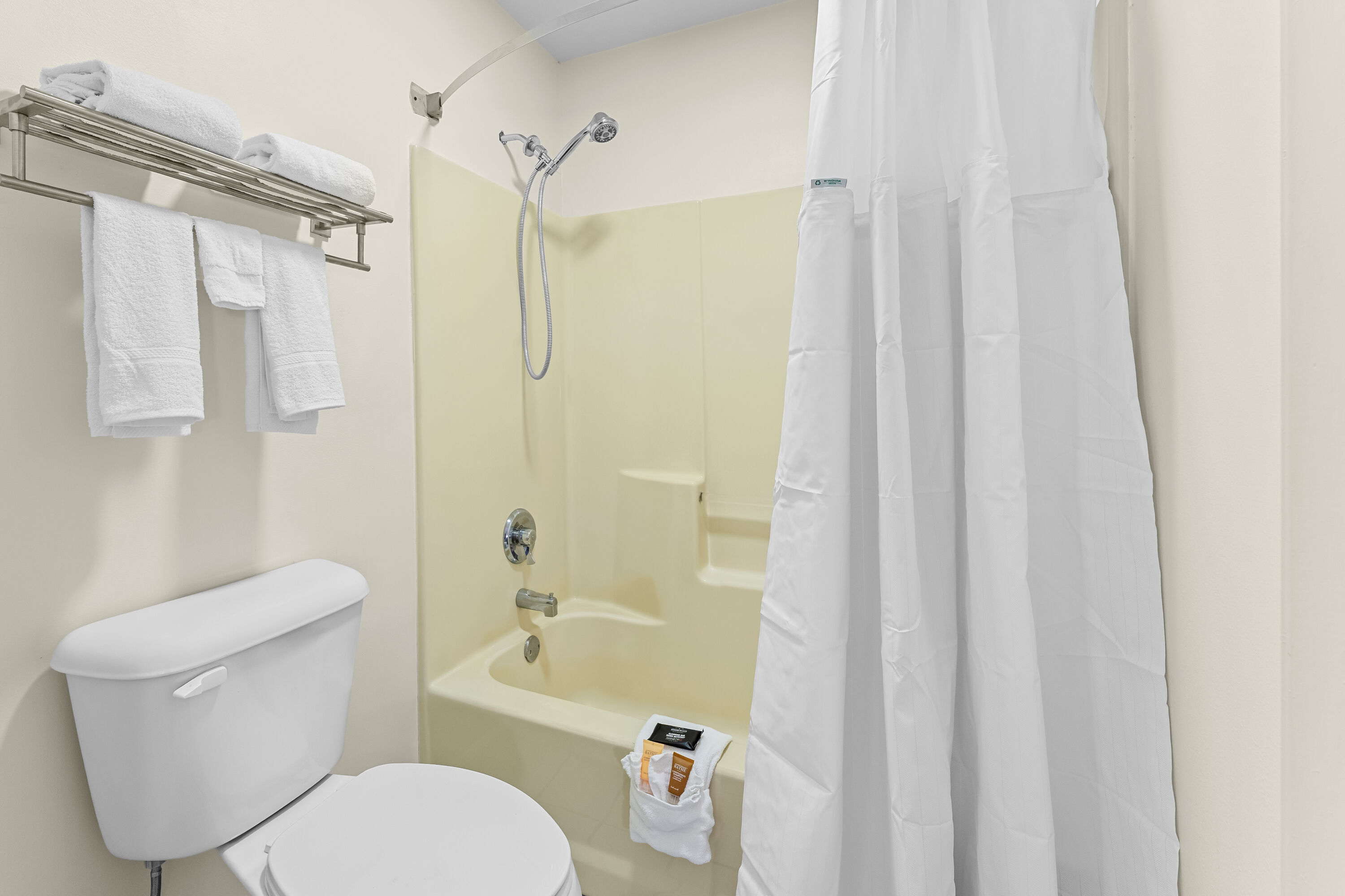 Guest room bath at the Baymont by Wyndham Sanford in Sanford, North Carolina