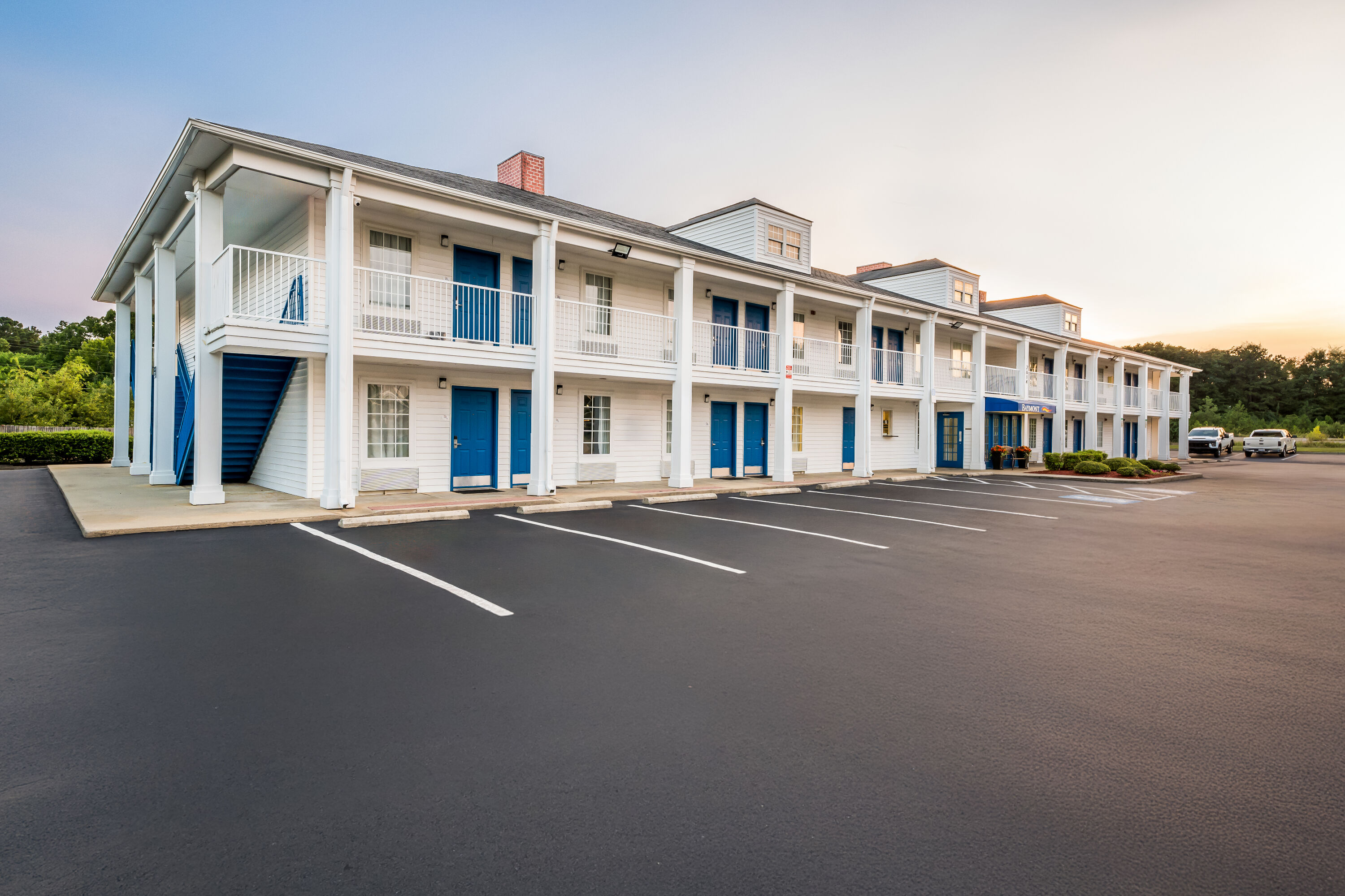 Exterior Night Image of Baymont by Wyndham Sanford hotel in Sanford, North Carolina