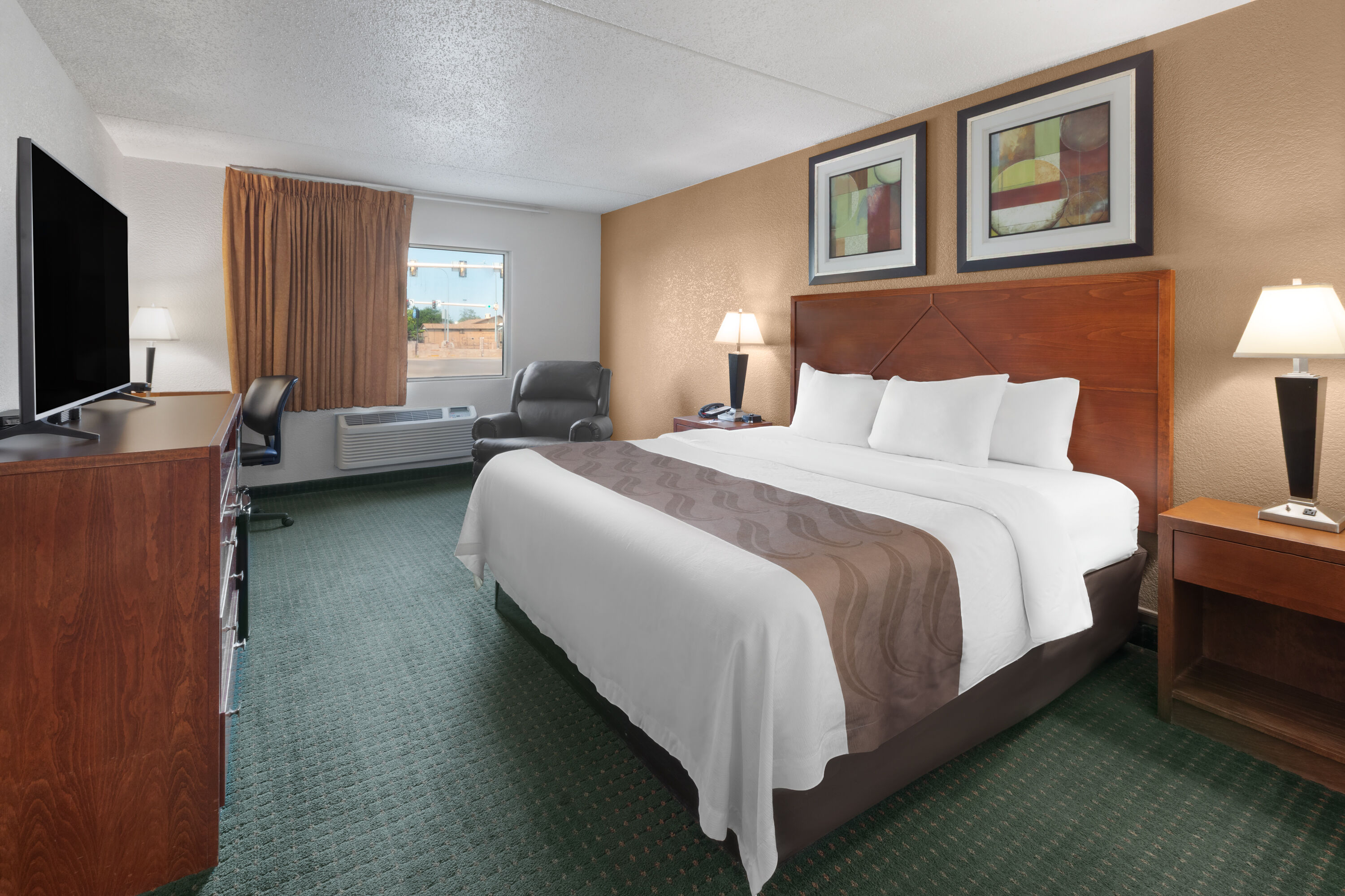 Guest room at the Baymont by Wyndham Jamestown Conference Center & Water Park in Jamestown, North Dakota