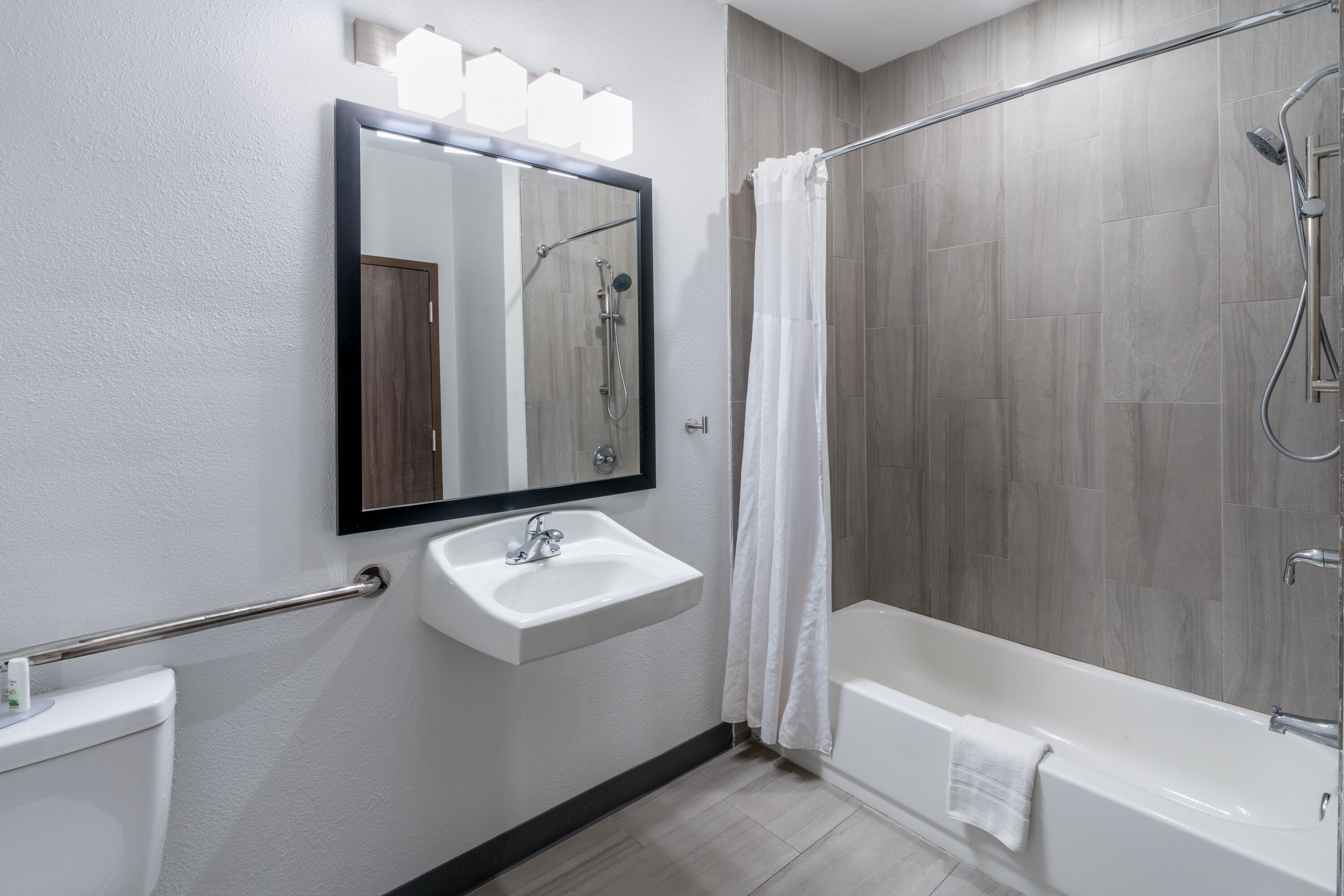 Guest room bath at the Baymont by Wyndham Carlsbad NM in Carlsbad, New Mexico