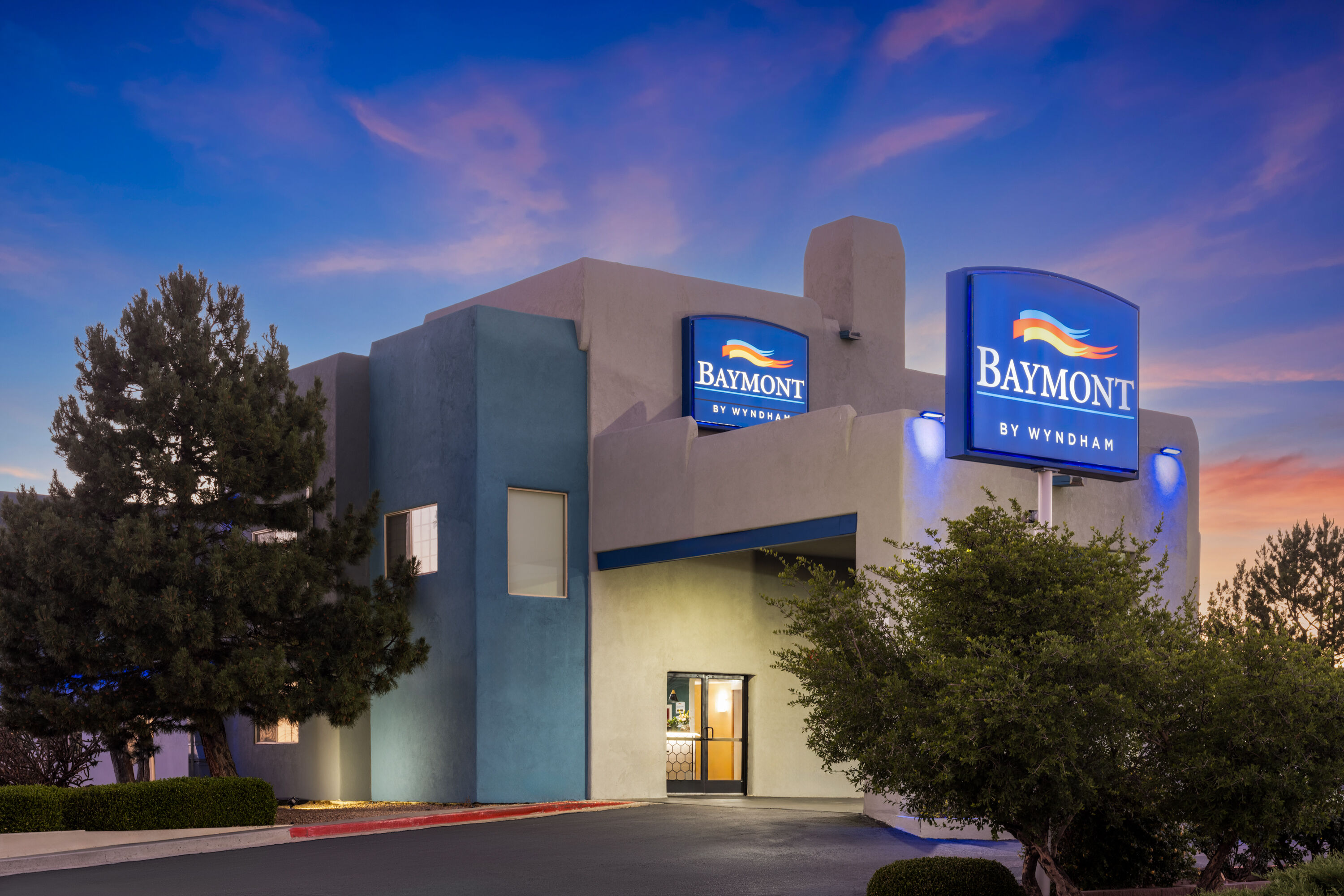 Exterior Dusk Image of Baymont by Wyndham Santa Fe hotel in Santa Fe, New Mexico