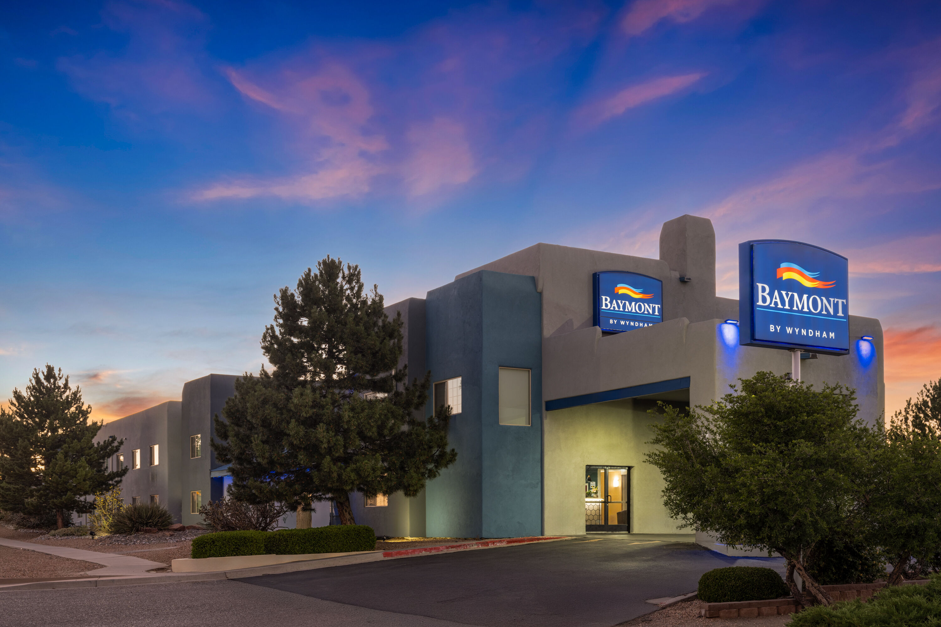 Exterior Dusk Image of Baymont by Wyndham Santa Fe hotel in Santa Fe, New Mexico