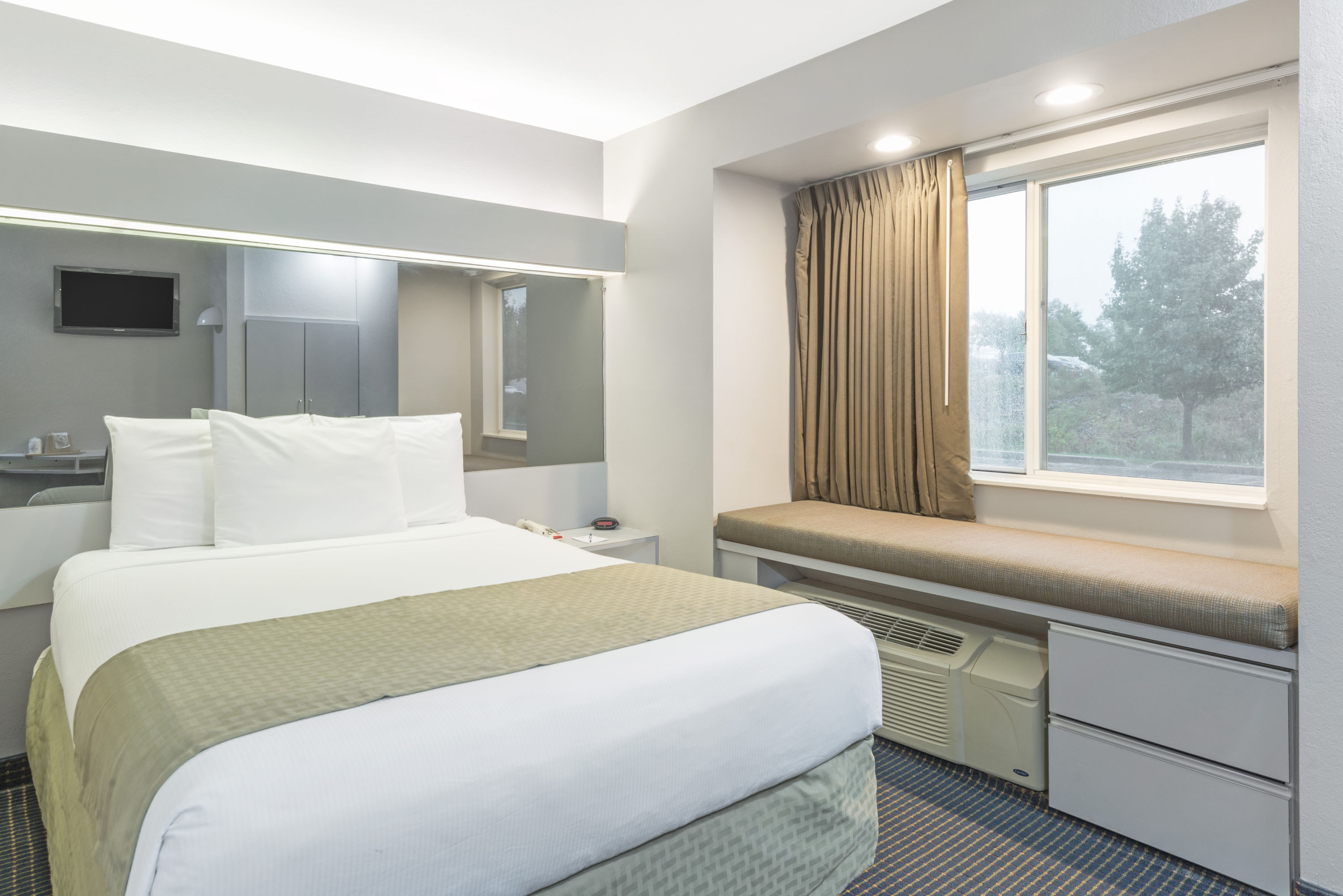 Guest room at the Baymont by Wyndham Henrietta/Rochester in Henrietta, New York