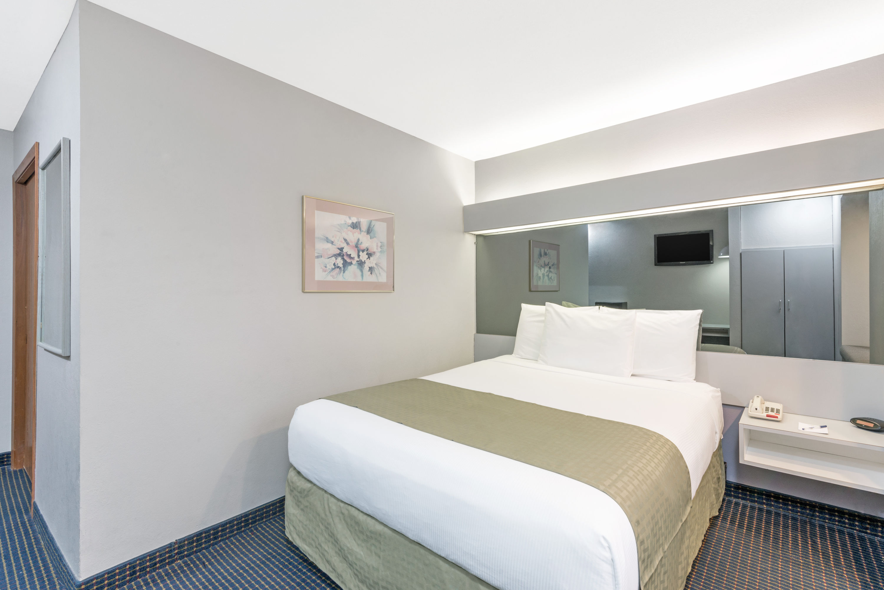 Guest room at the Baymont by Wyndham Henrietta/Rochester in Henrietta, New York