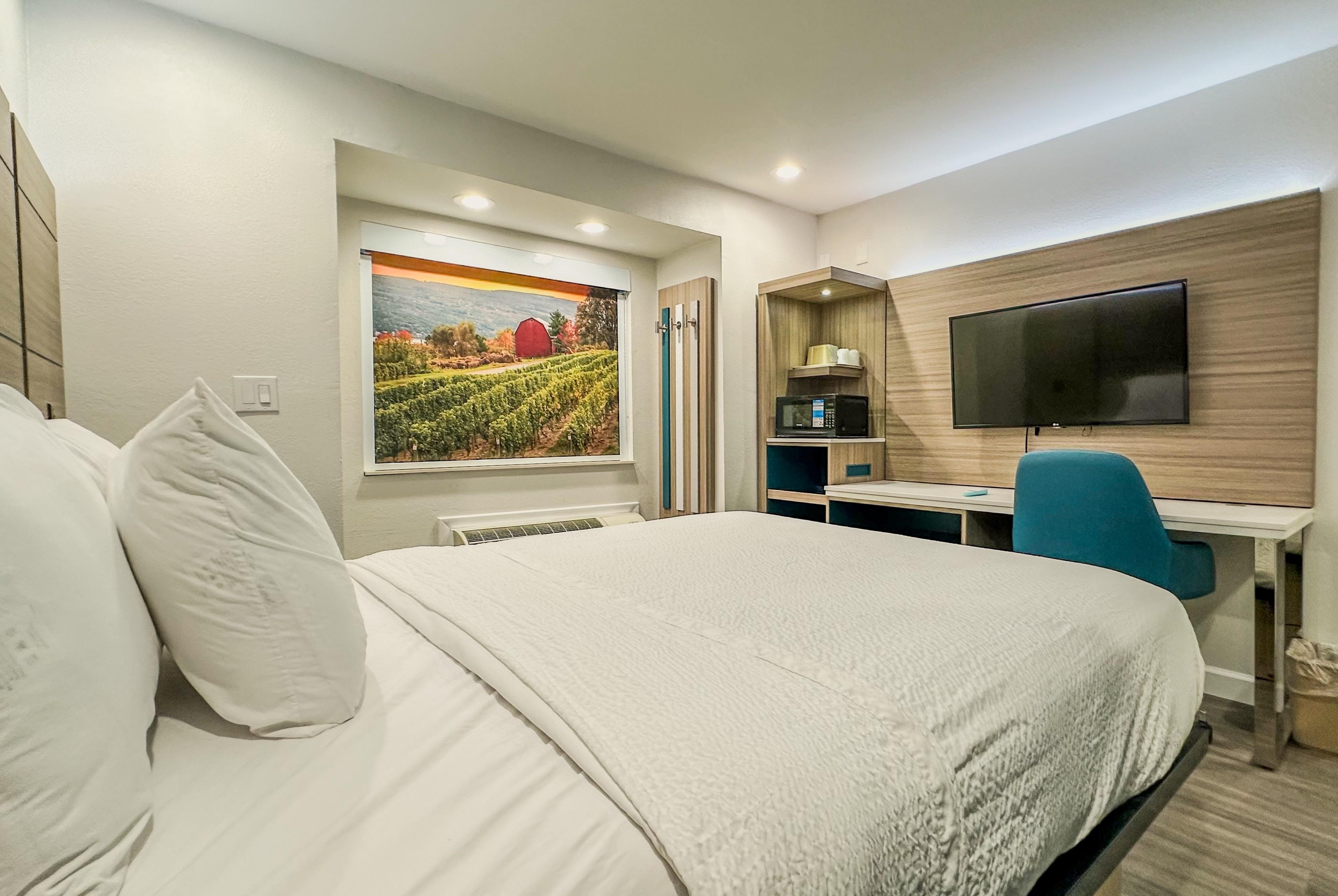 Guest room at the Baymont by Wyndham Henrietta/Rochester in Henrietta, New York