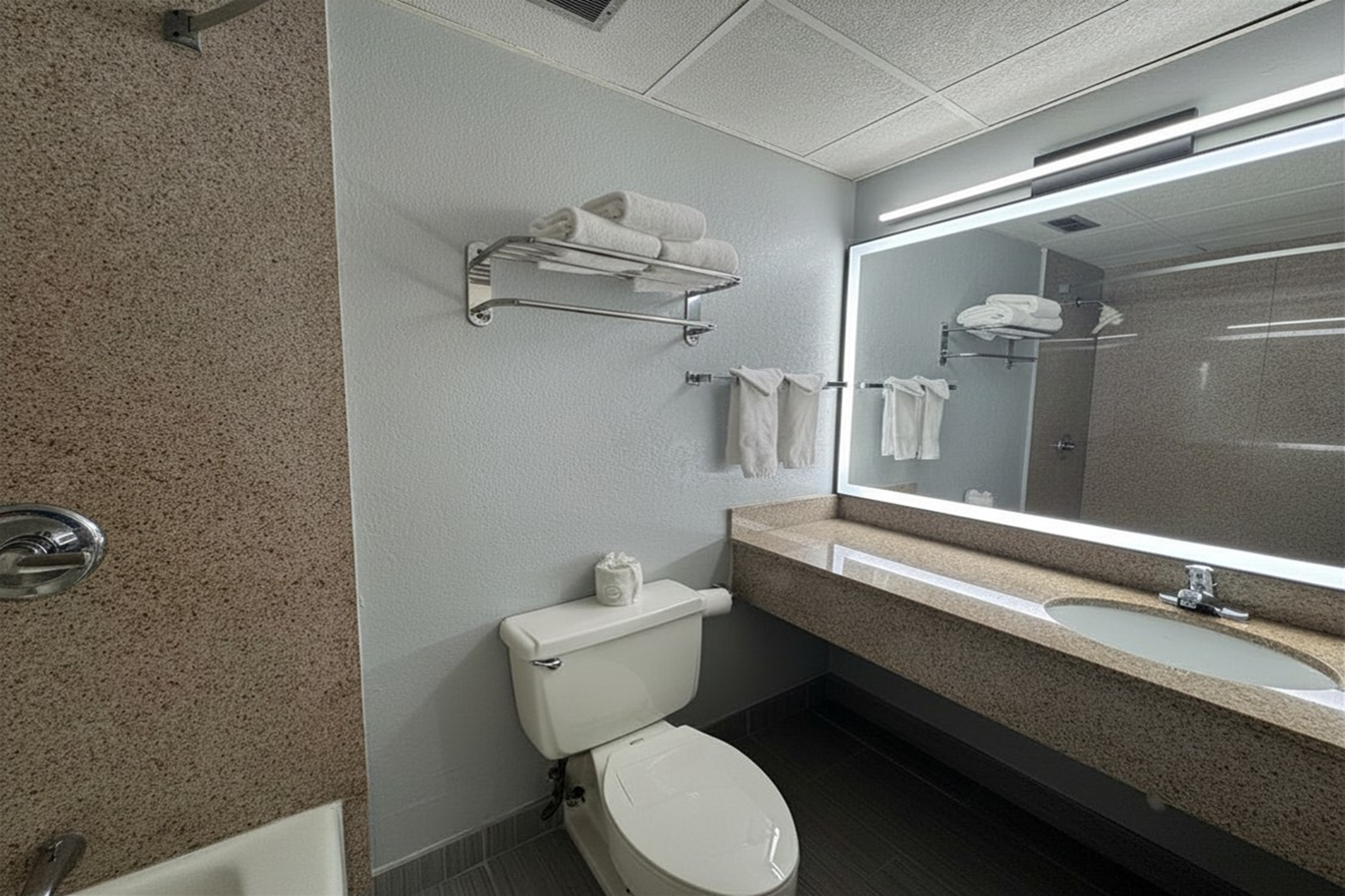 Guest room bath at the Baymont by Wyndham Queensbury Lake George in Queensbury, New York