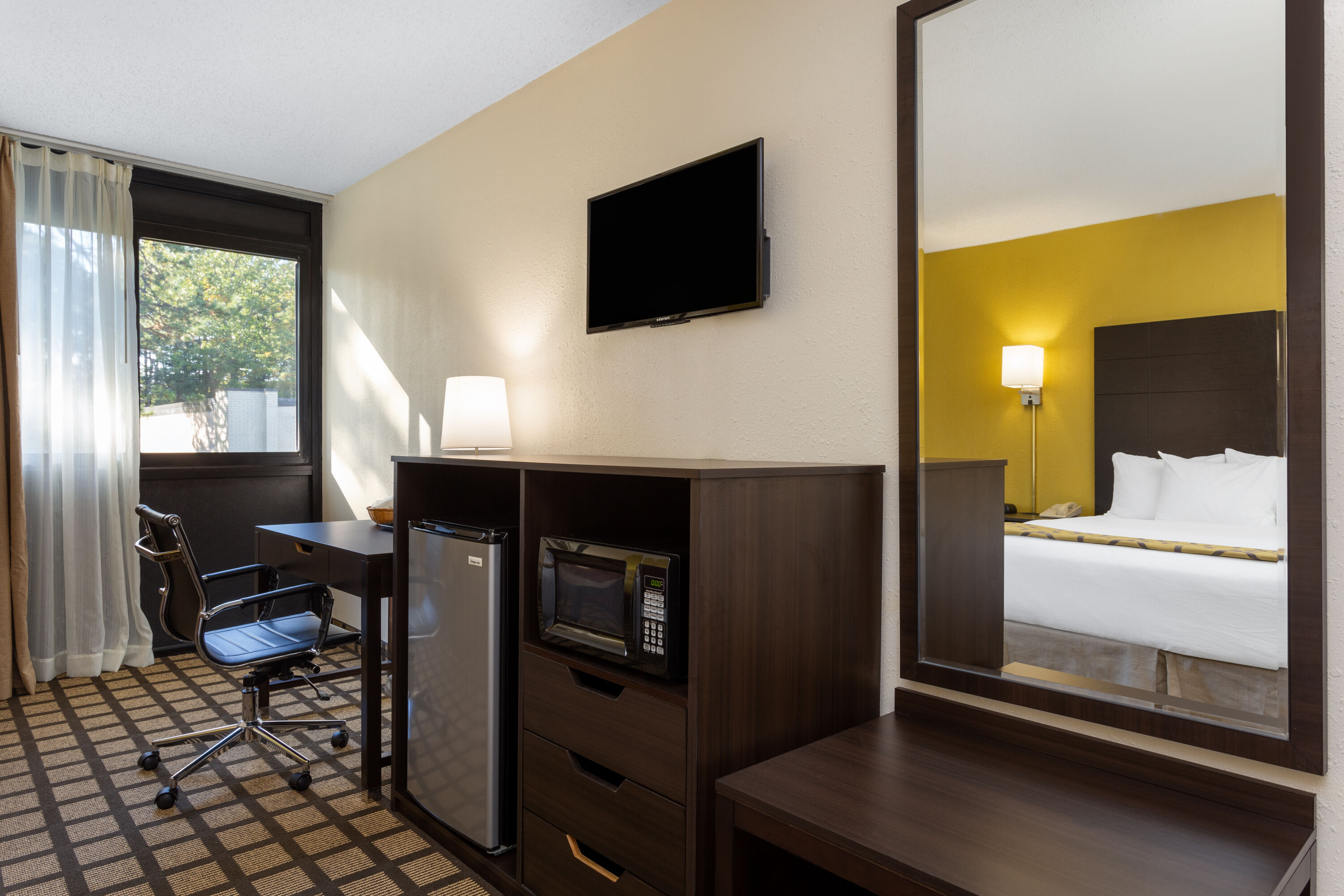 Guest room at the Baymont by Wyndham Queensbury Lake George in Queensbury, New York