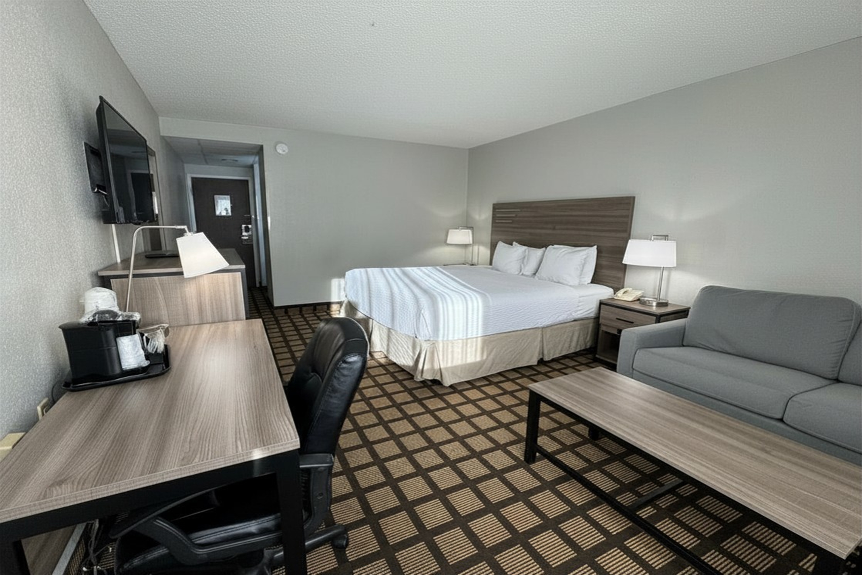 Guest room at the Baymont by Wyndham Queensbury Lake George in Queensbury, New York